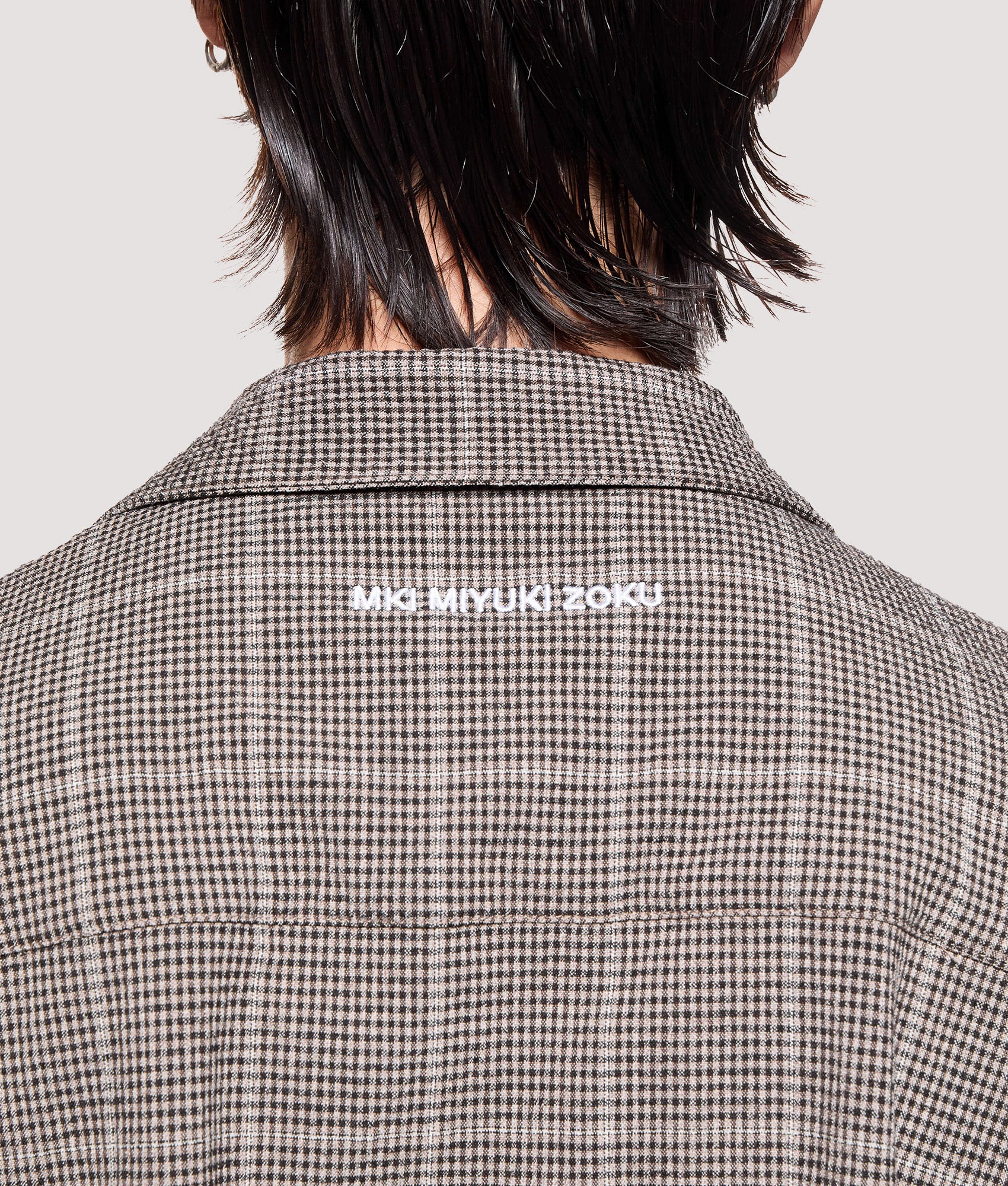 MKI MIYUKI ZOKU Box Fit Linen Short Sleeve Vacation Shirt in Brown at EQVVS Menswear. Back detail shot.