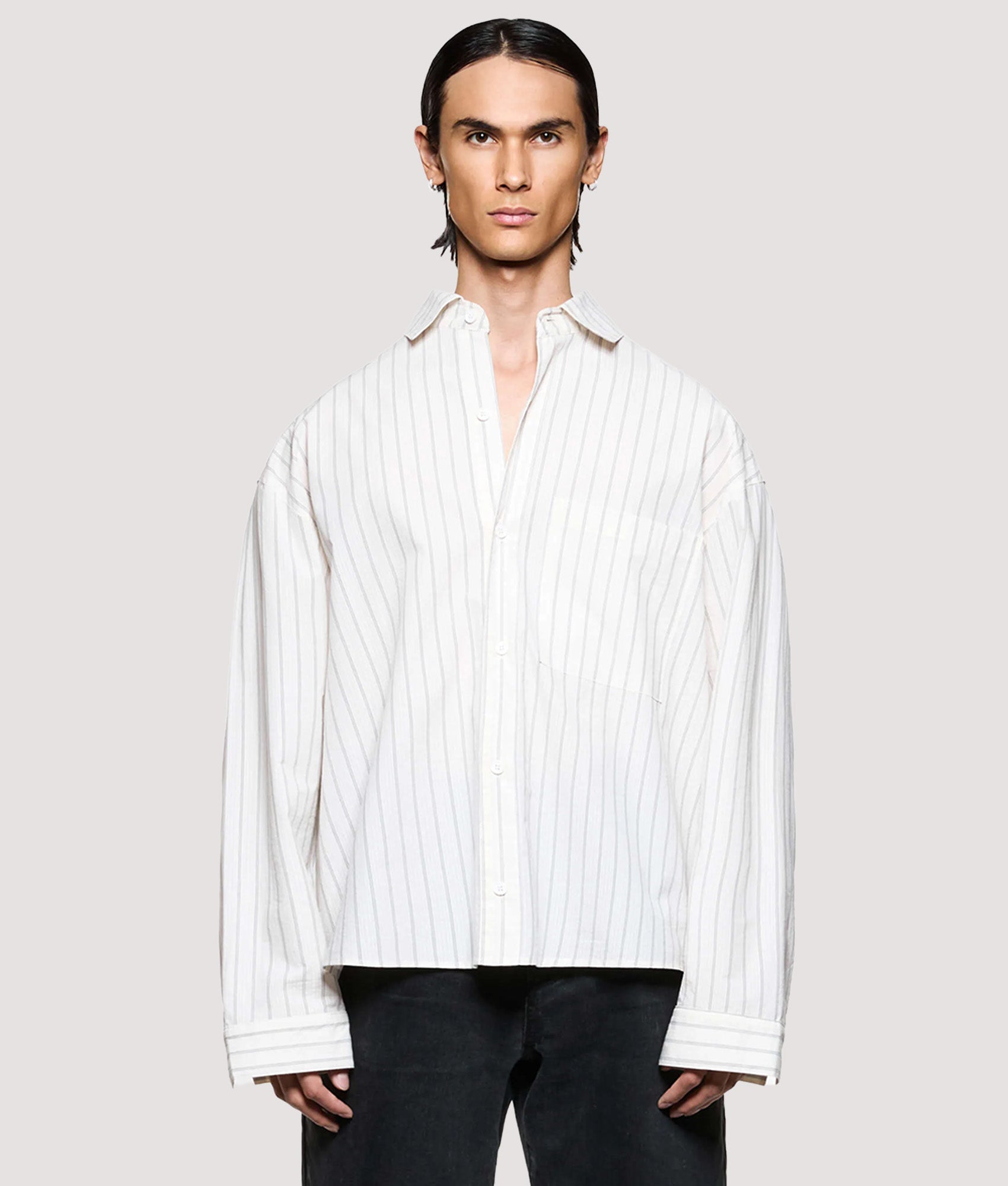 MKI MIYUKI ZOKU Box Fit Seersucker Stripe Dress Shirt in Off White at EQVVS Menswear. Model front shot.