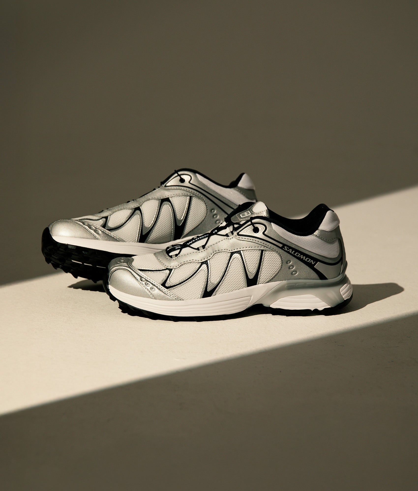 XT-WHISPER Sneakers by Salomon in White. Shot by EQVVS. Campaign Shot.