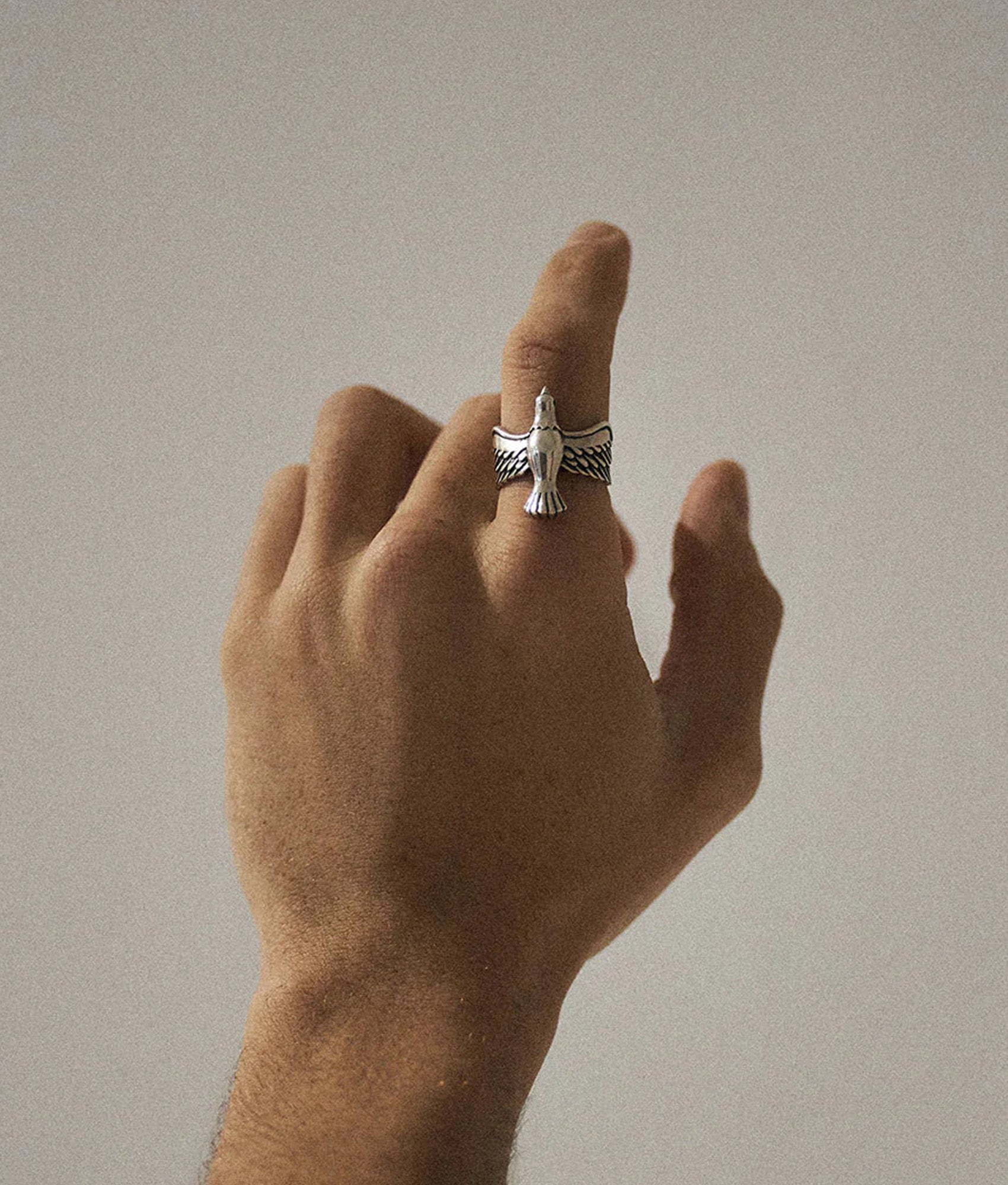 Serge Denimes Silver Dove Ring at EQVVS Menswear. Model shot.