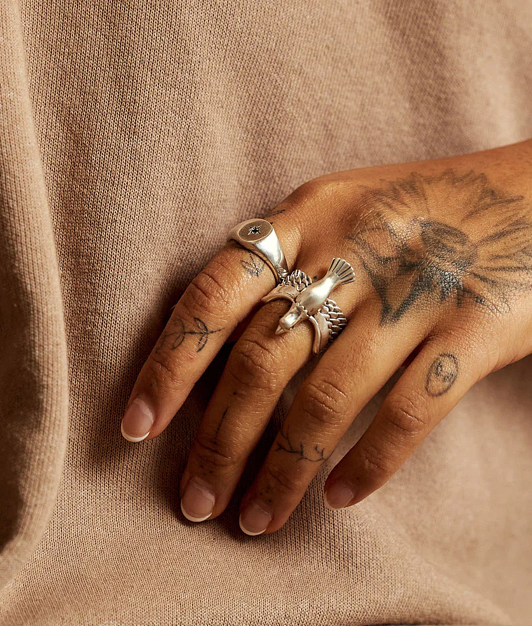 Serge Denimes Silver Dove Ring at EQVVS Menswear. Second Model shot.