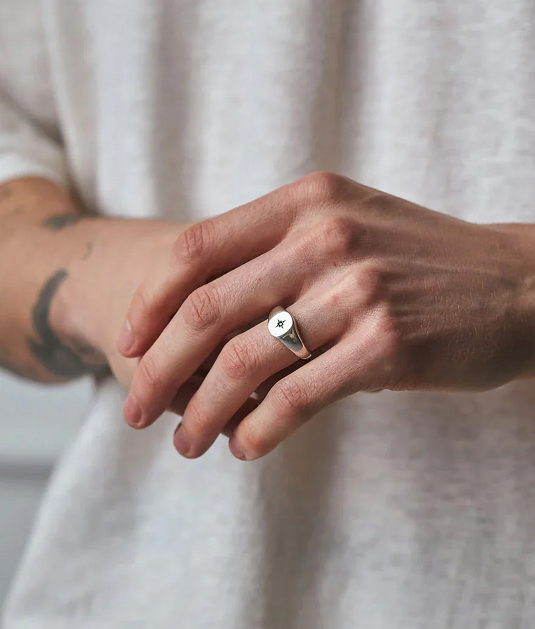 Silver Envy Ring by Serge Denimes at EQVVS Menswear. Model shot.