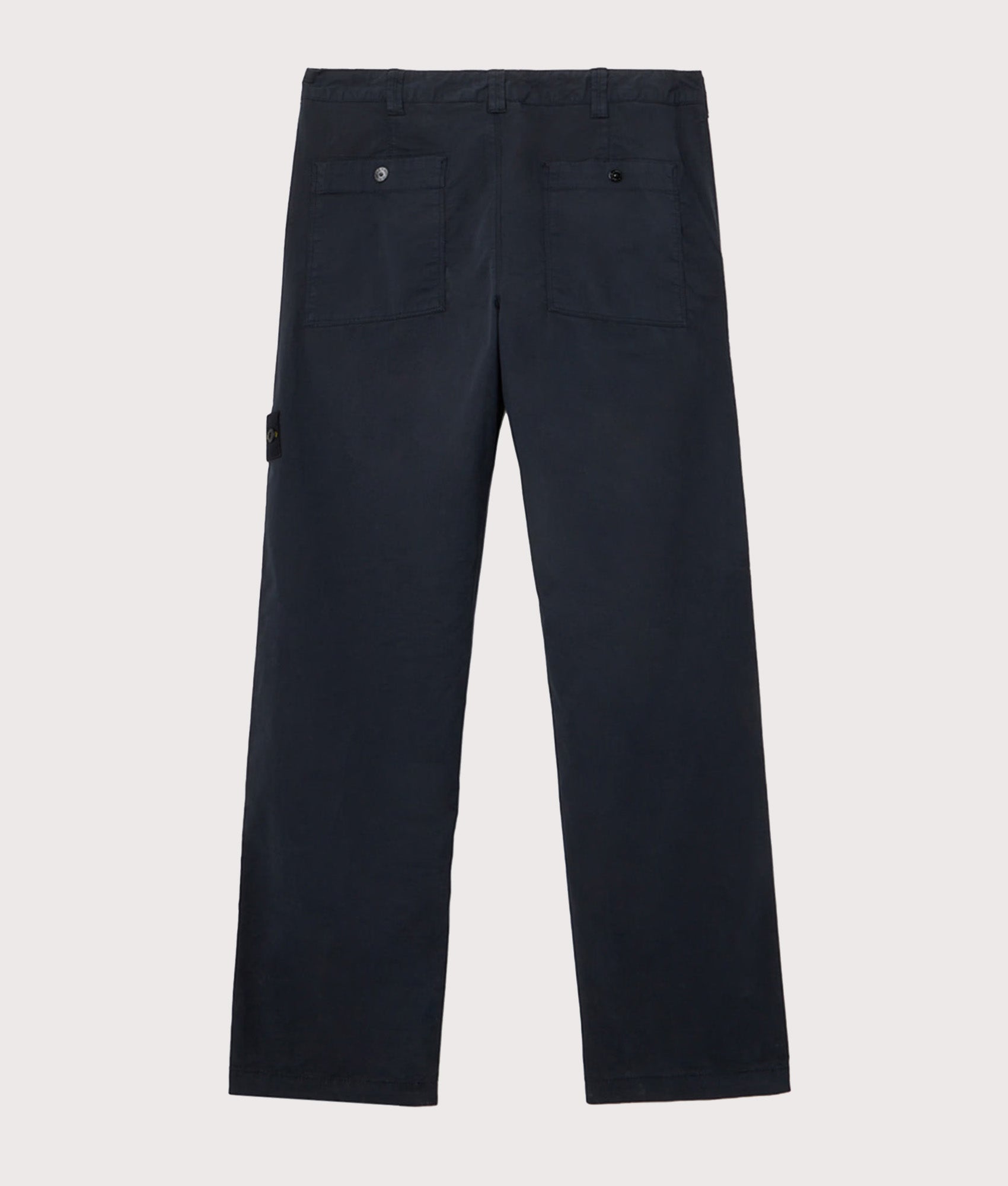 Stone Island Trousers in the Navy Blue at EQVVS Menswear. Back shot.