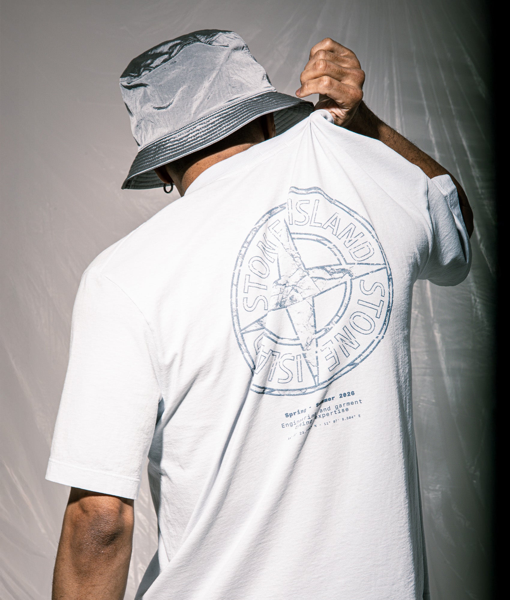 Stone Island Relaxed Fit Stone Back Print T-Shirt in Sky Blue at EQVVS Menswear. Campaign shot.