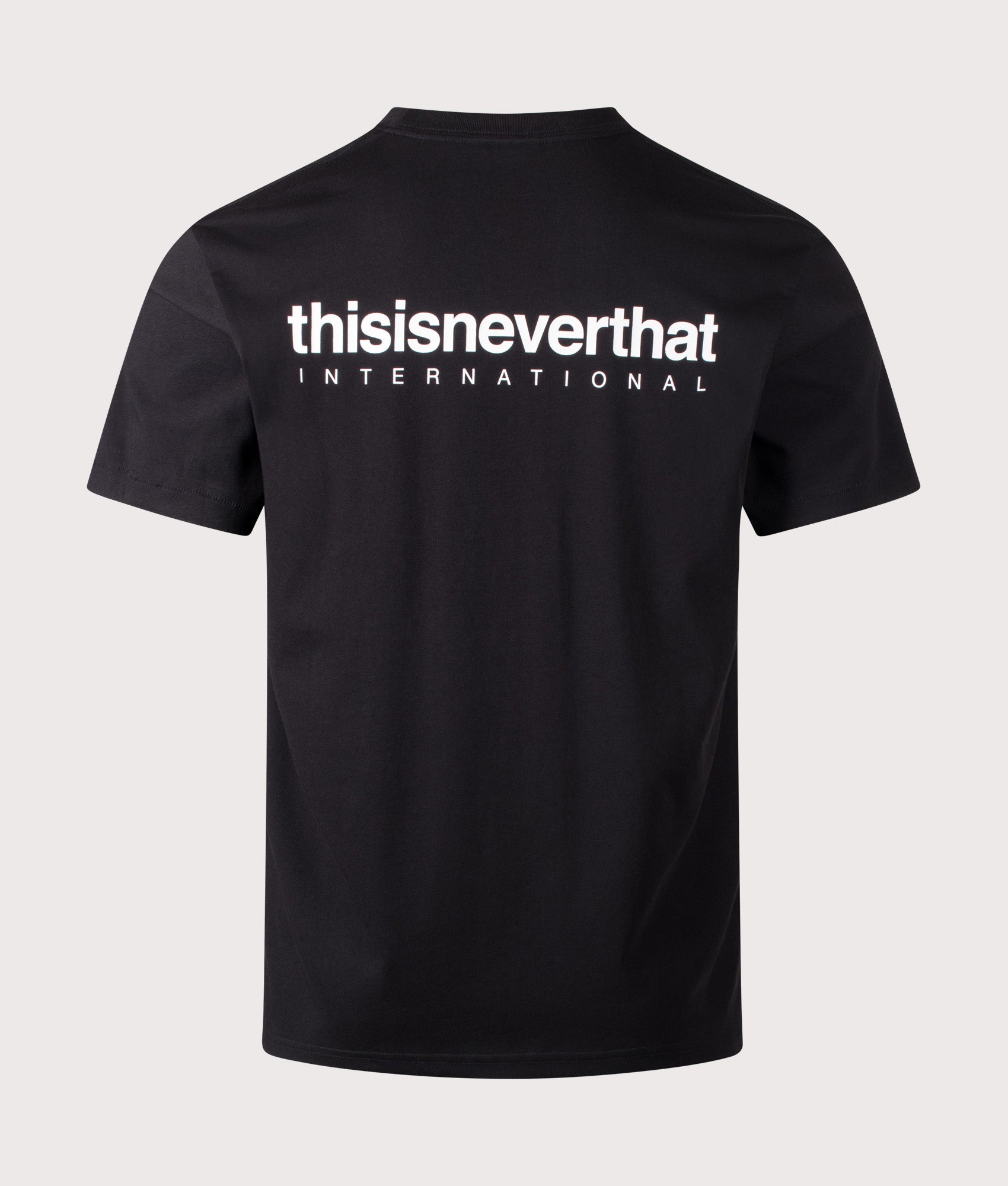 INTL. Logo T-Shirt in Black by thisisneverthat. Shot by EQVVS. Back Shot.