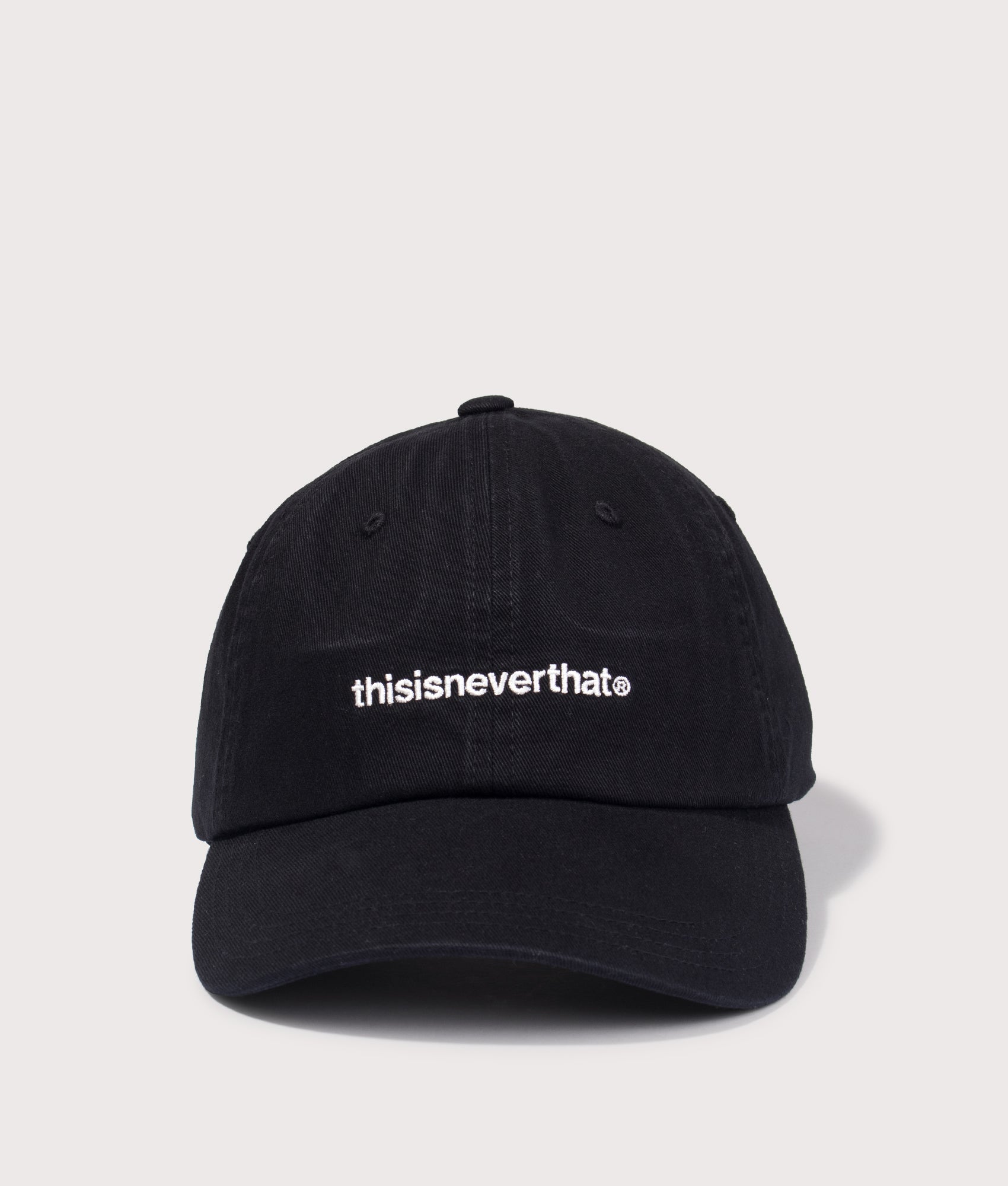 T-Logo Cap in Black by thisisneverthat. Shot by EQVVS. Front shot.