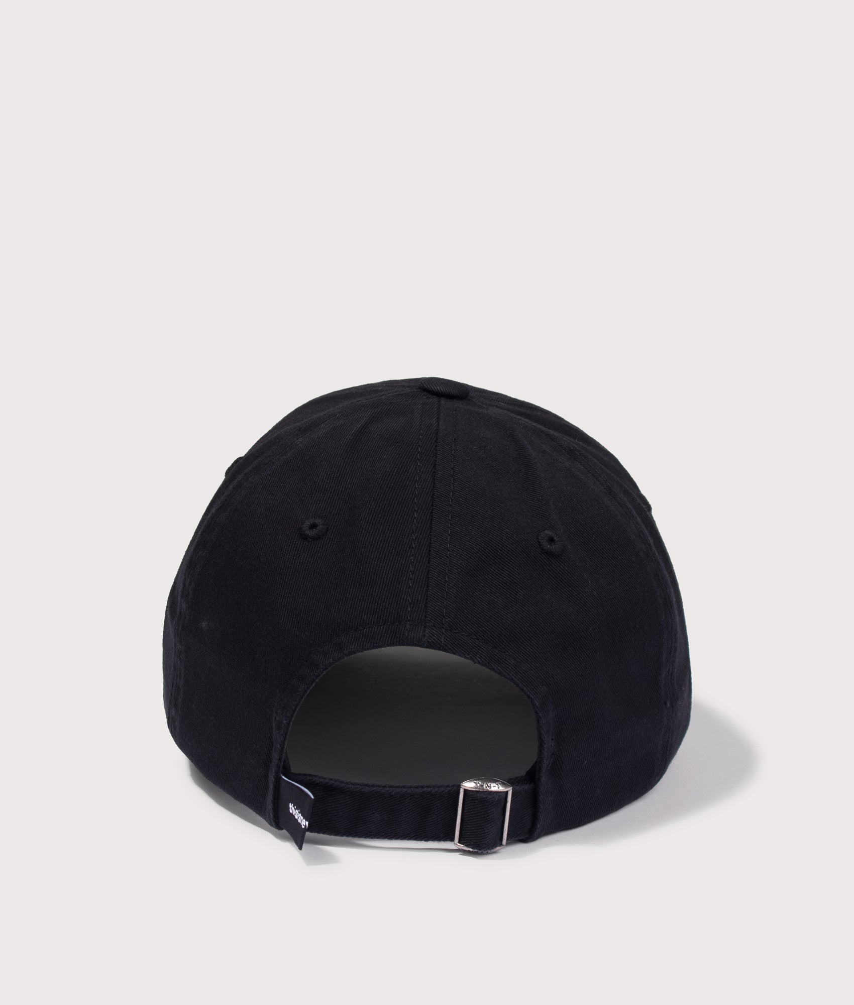 T-Logo Cap in Black by thisisneverthat. Shot by EQVVS. Back shot.