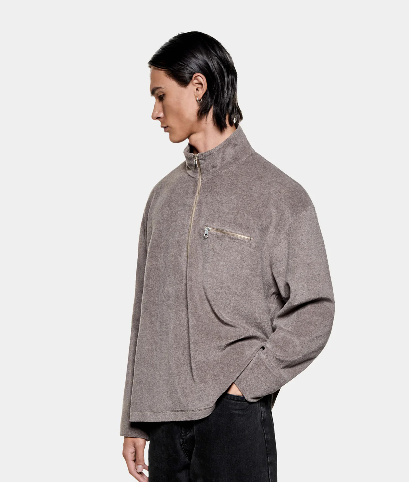 MKI MIYUKI ZOKU Towelling Quarter Zip Sweatshirt in Brown at EQVVS Menswear. Angled model front shot.