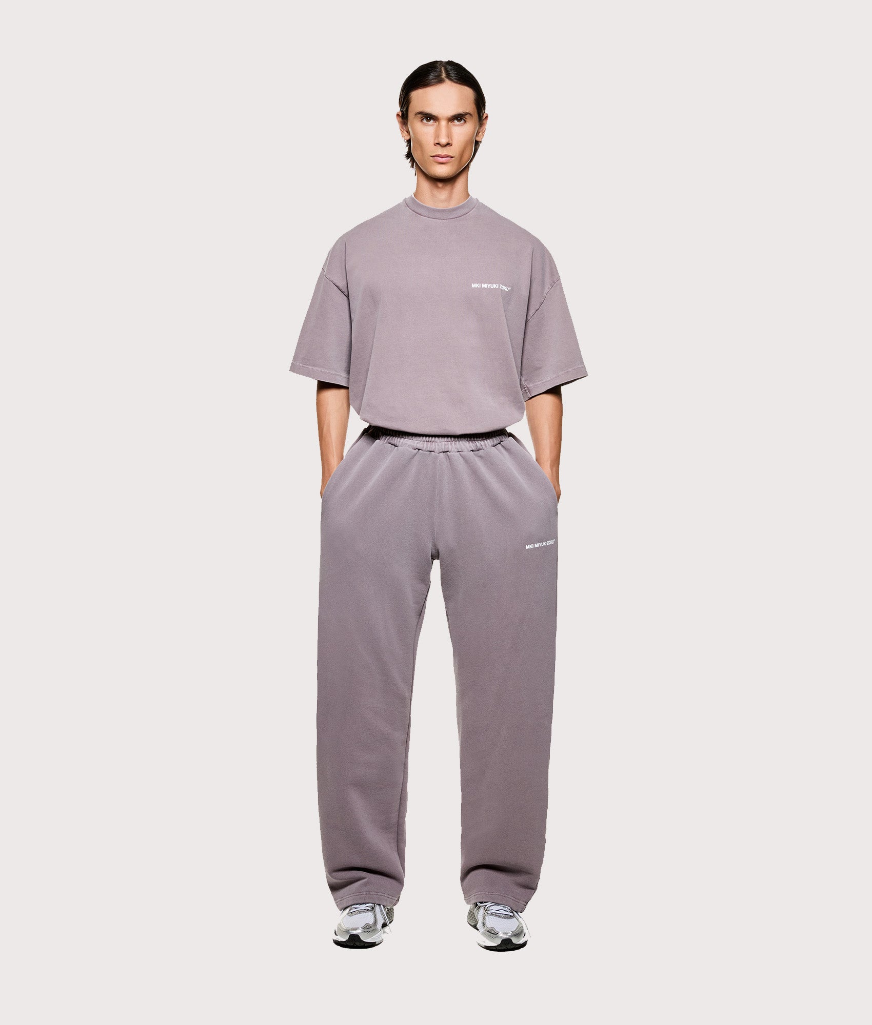 MKI MIYUKI ZOKU Uniform Wide Leg Joggers in Pigment Raisin. Front shot.