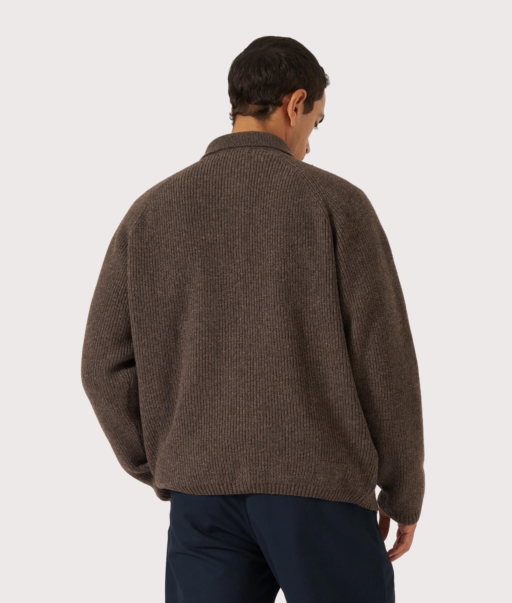 Universal Works Zip Cardigan in Brown at EQVVS Menswear. Model back shot.
