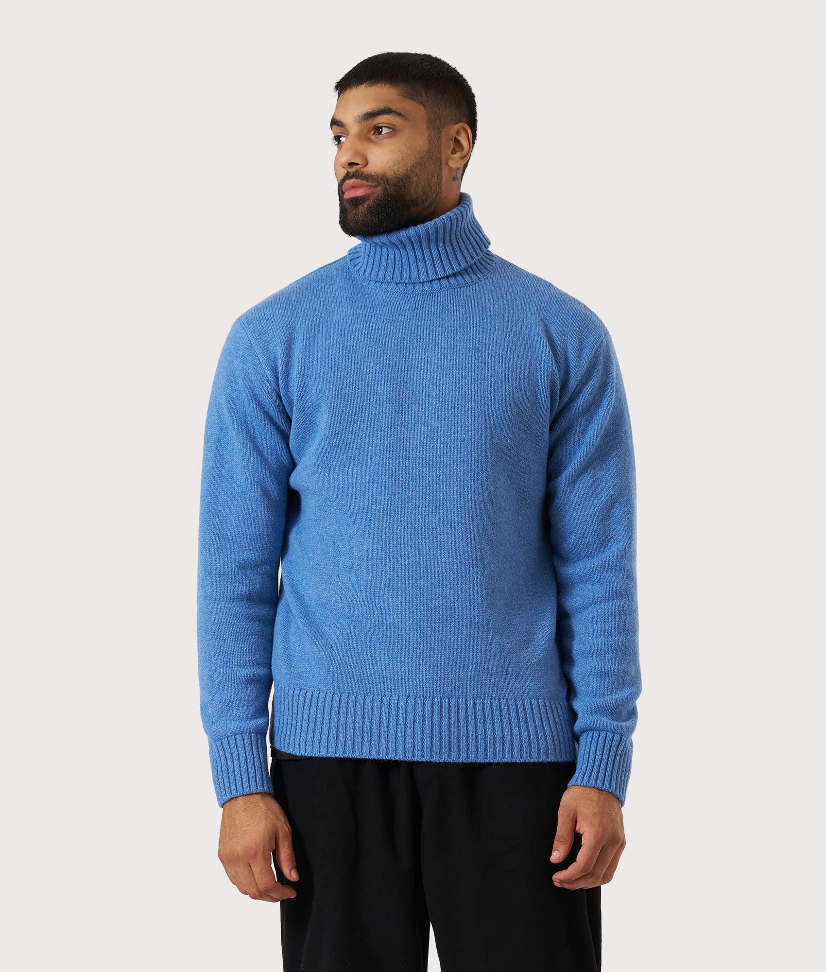 Universal Works Three Button Jacket in Pale Blue at EQVVS Menswear. Model front shot.