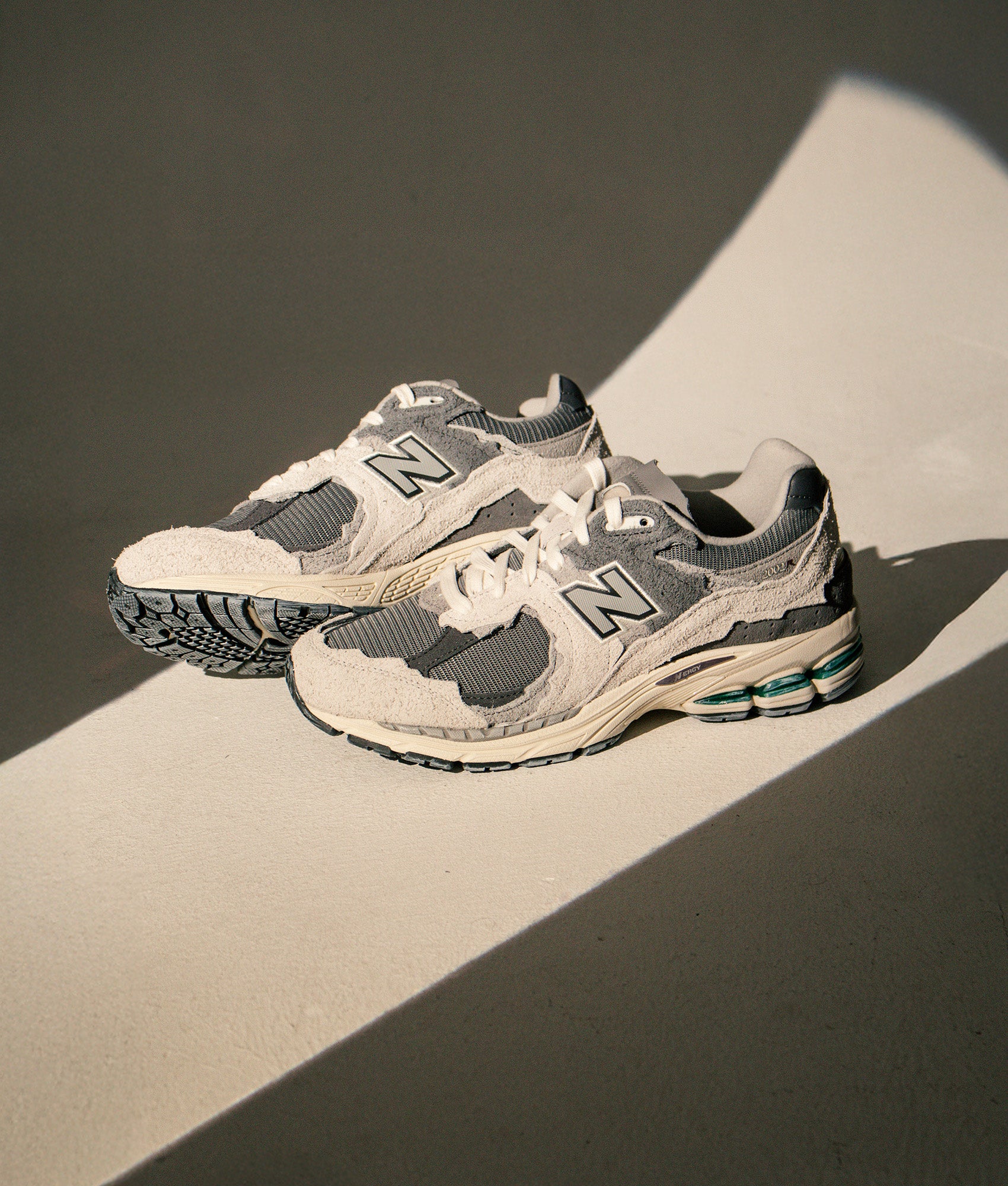 2002R Protection Pack Sneakers. Shot by EQVVS. Campaign shot.