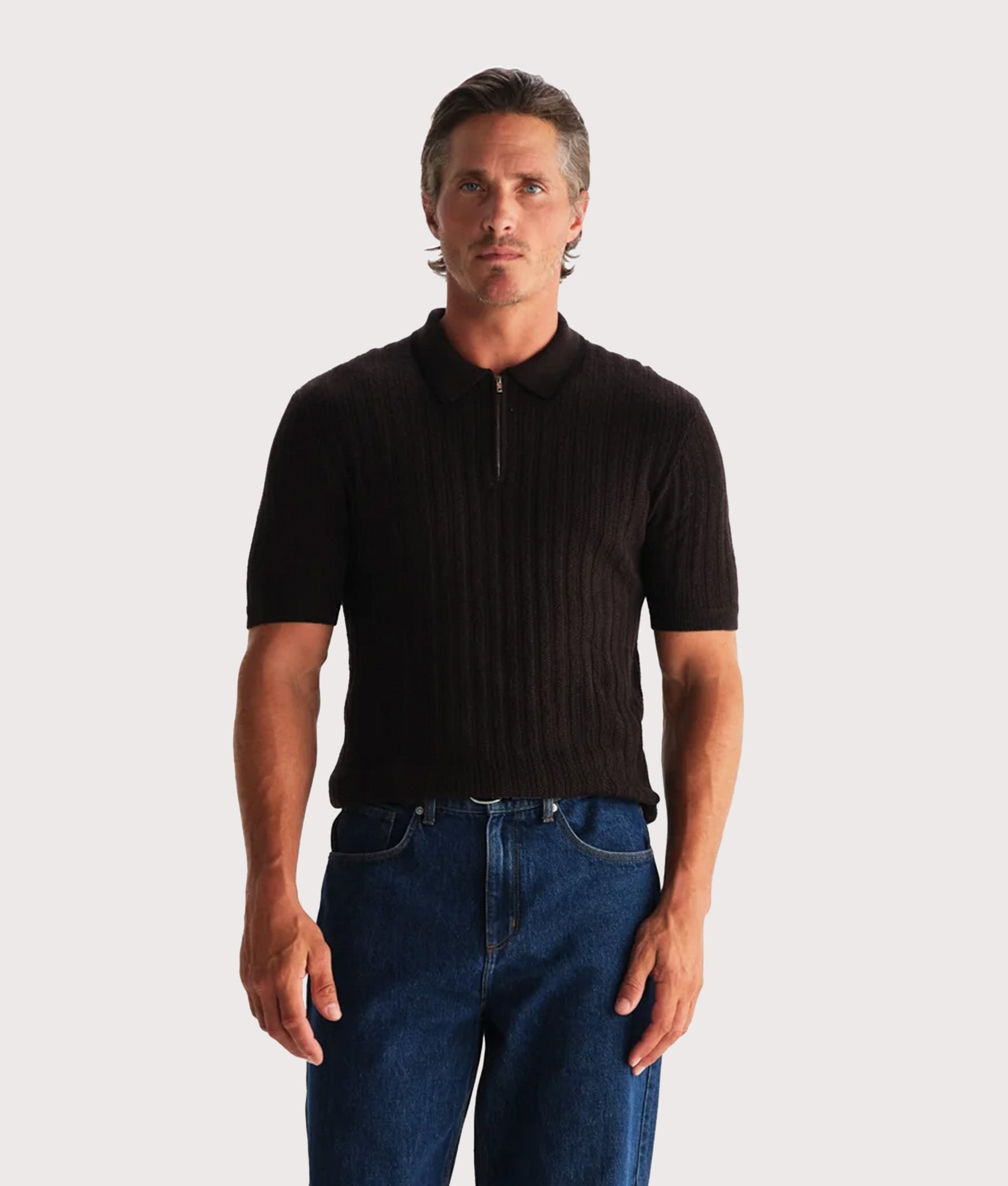 Bury Quarter Zip Knit Polo Shirt by Wax London nin Dark Brown. Model Front shot.