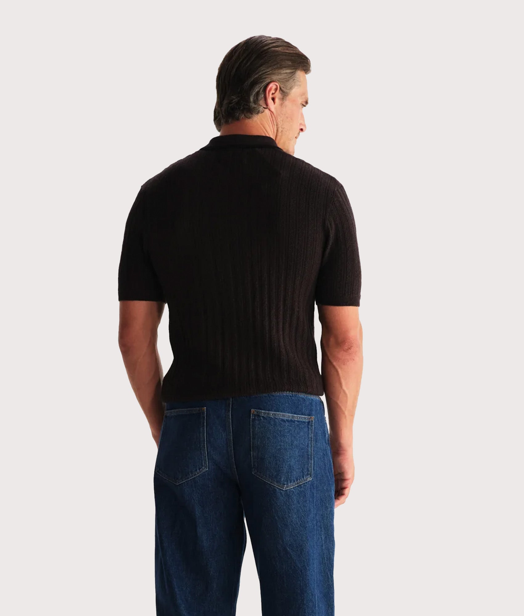 Bury Quarter Zip Knit Polo Shirt by Wax London nin Dark Brown. Model Back shot.