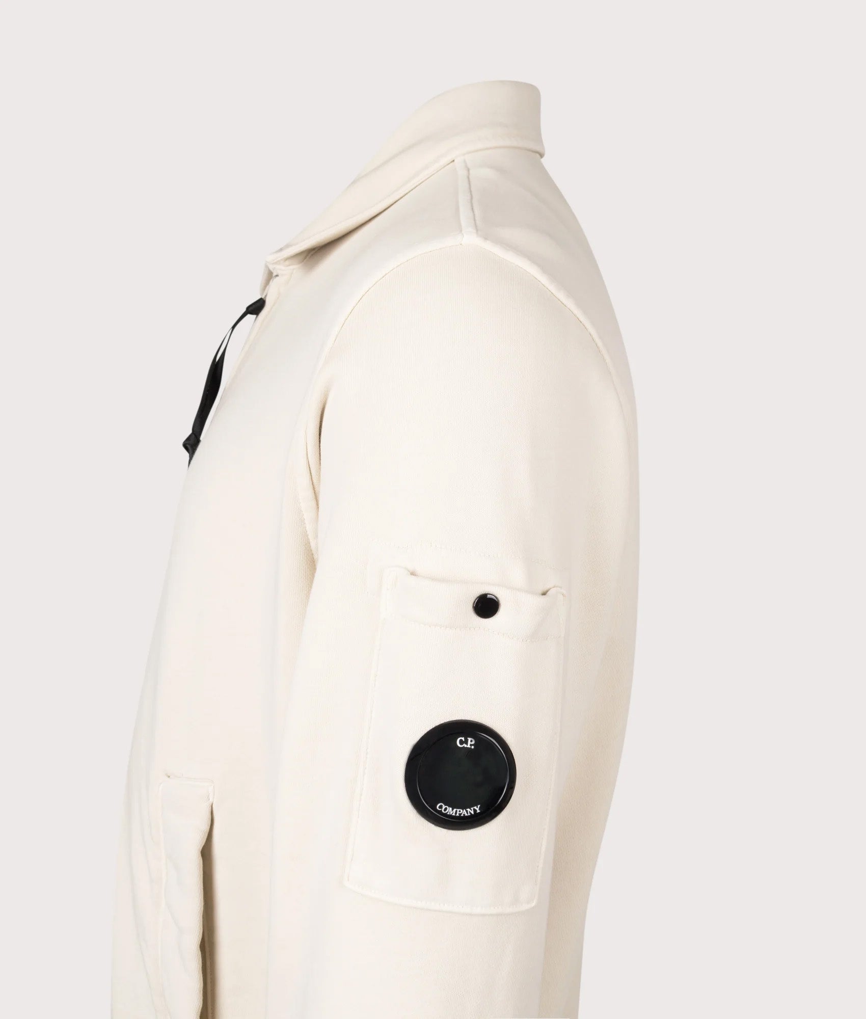 C.P. Company Diagonal Fleece Zip Lens Sweatshirt in Frozen Dew at EQVVS Menswear. Side detail shot.