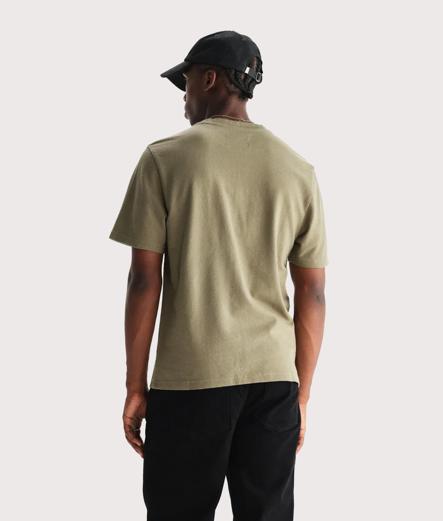 Wax London Dean Short Sleeve T-Shirt in Green at EQVVS Menswear. Model Back shot.