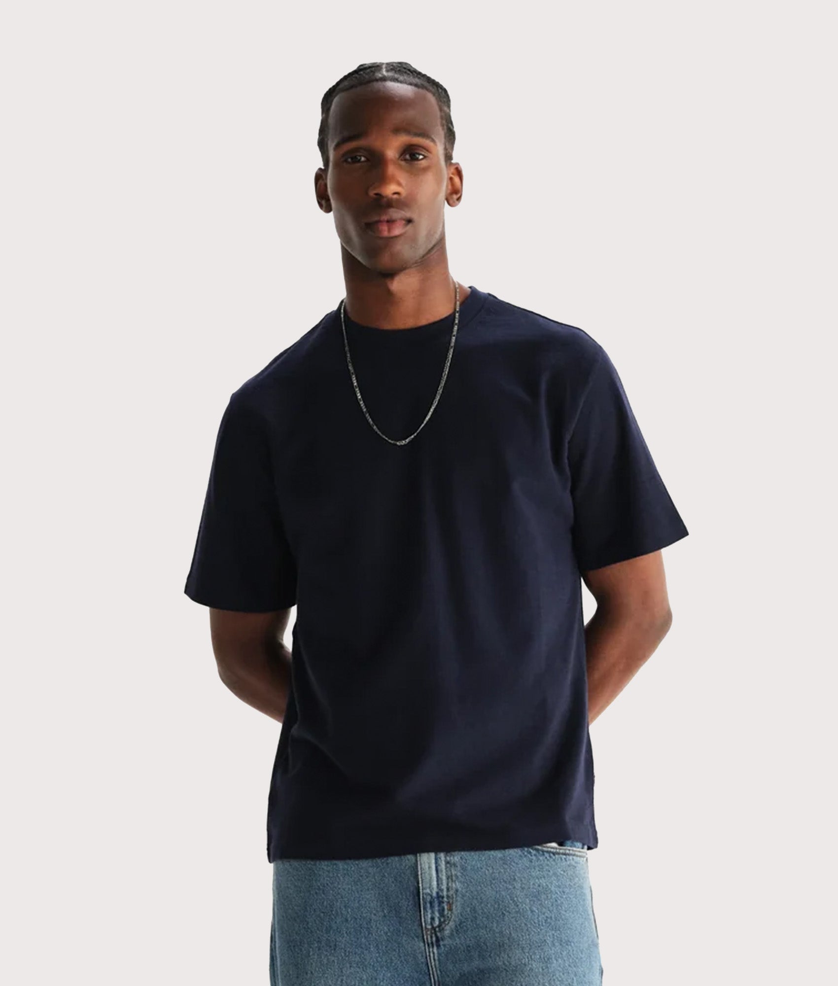 Wax London Dean Short Sleeve T-Shirt in Navy at EQVVS Menswear. Model front shot.