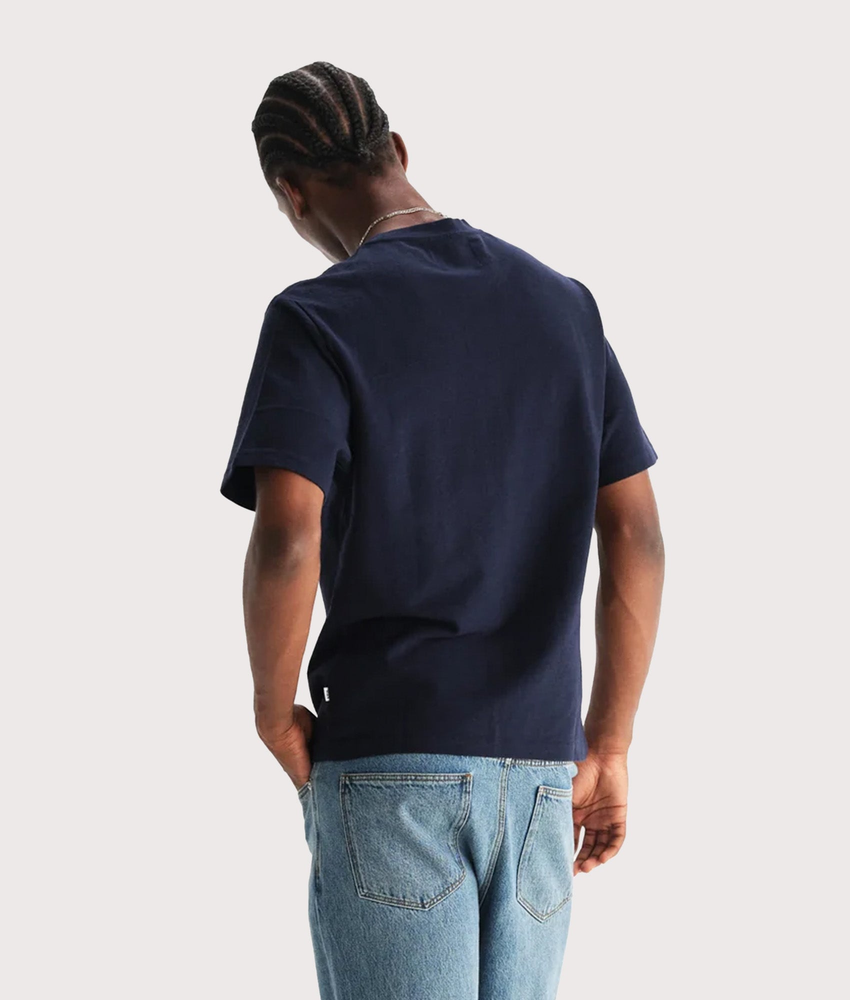 Wax London Dean Short Sleeve T-Shirt in Navy at EQVVS Menswear. Model Back shot.