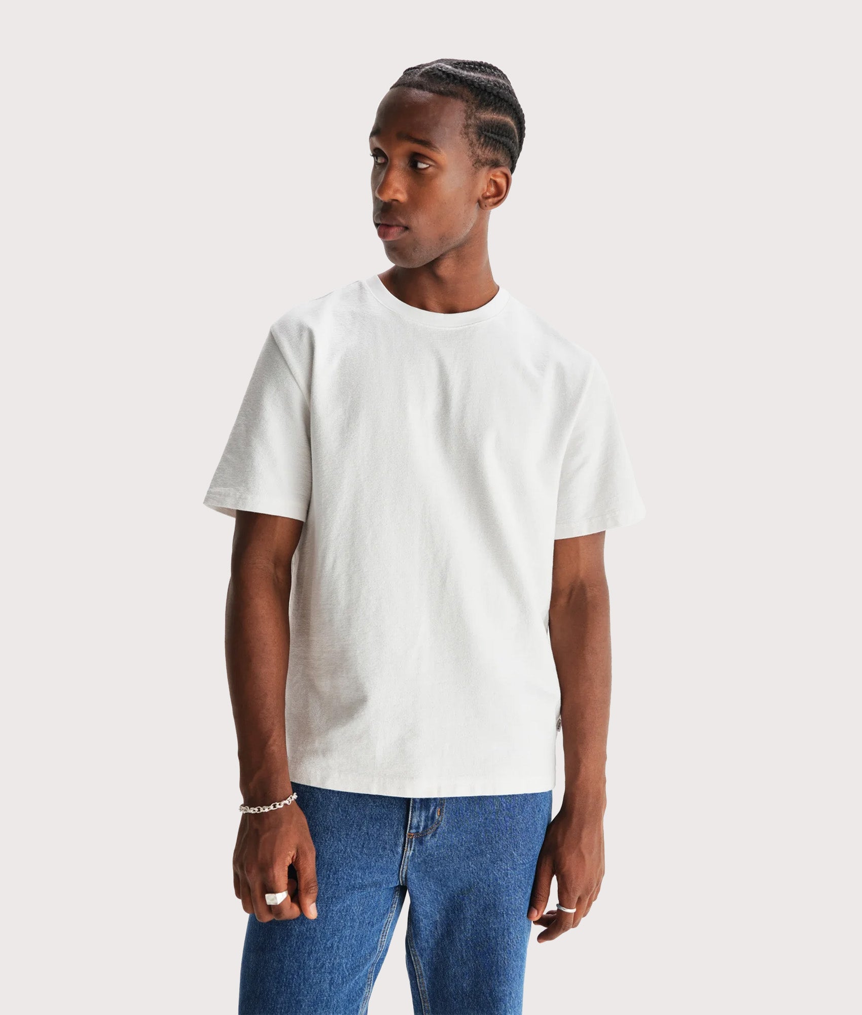 Wax London Dean Short Sleeve T-Shirt in White at EQVVS Menswear. Model front shot.