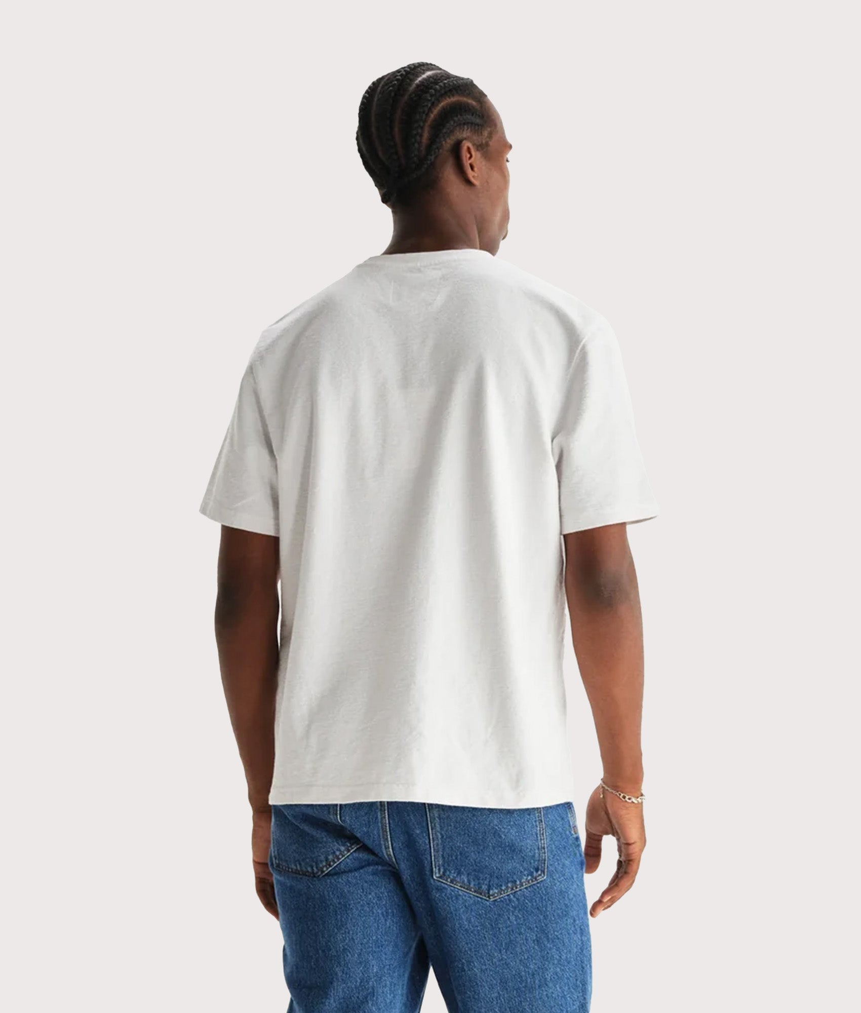 Wax London Dean Short Sleeve T-Shirt in White at EQVVS Menswear. Model Back shot.