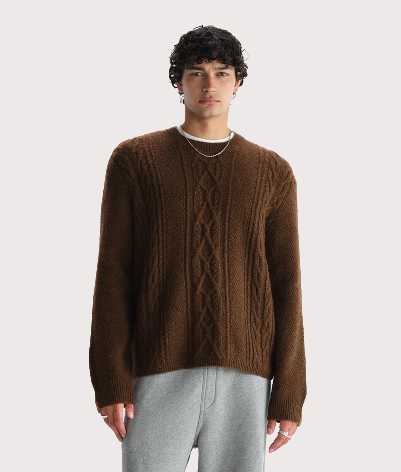 Hyatt Crew Jumper by Wax London in Brown at EQVVS Menswear. Model front shot.