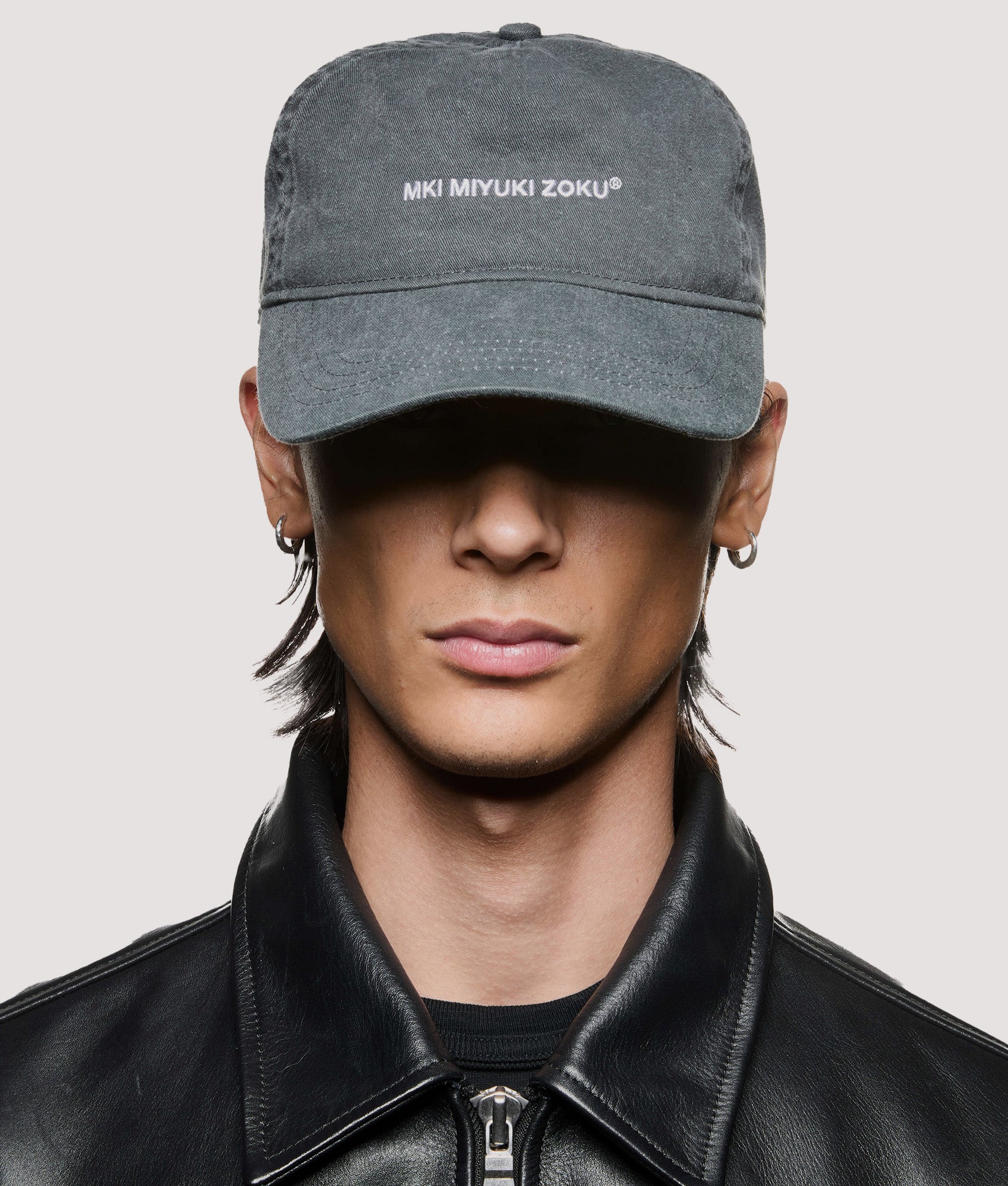 MKI MIYUKI ZOKU V2 Twill Baseball Cap in Pigment Black at EQVVS Menswear. Model front shot.