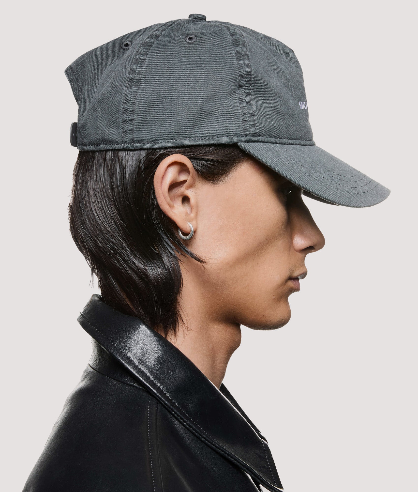 MKI MIYUKI ZOKU V2 Twill Baseball Cap in Pigment Black at EQVVS Menswear. Model side shot.
