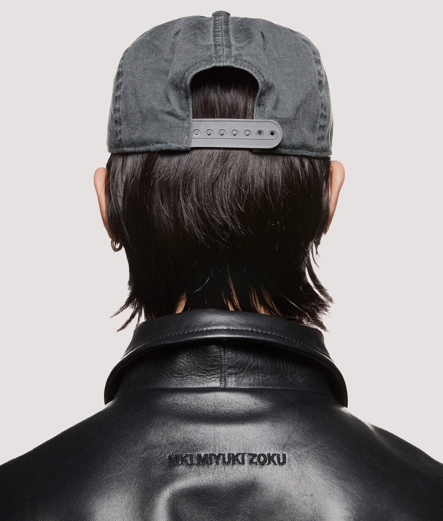 MKI MIYUKI ZOKU V2 Twill Baseball Cap in Pigment Black at EQVVS Menswear. Model back shot.