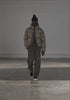 MKI MIYUKI ZOKU Translucent Bubble Jacket In Khaki at EQVVS Menswear. Catwalk Video 
