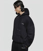 MKI MIYUKI ZOKU Oversized Uniform Hoodie in black at EQVVS Menswear. Model video. 