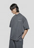 MKI Miyuki Zoku Uniform T-Shirt in Pigment Black at EQVVS Menswear. Model video. 