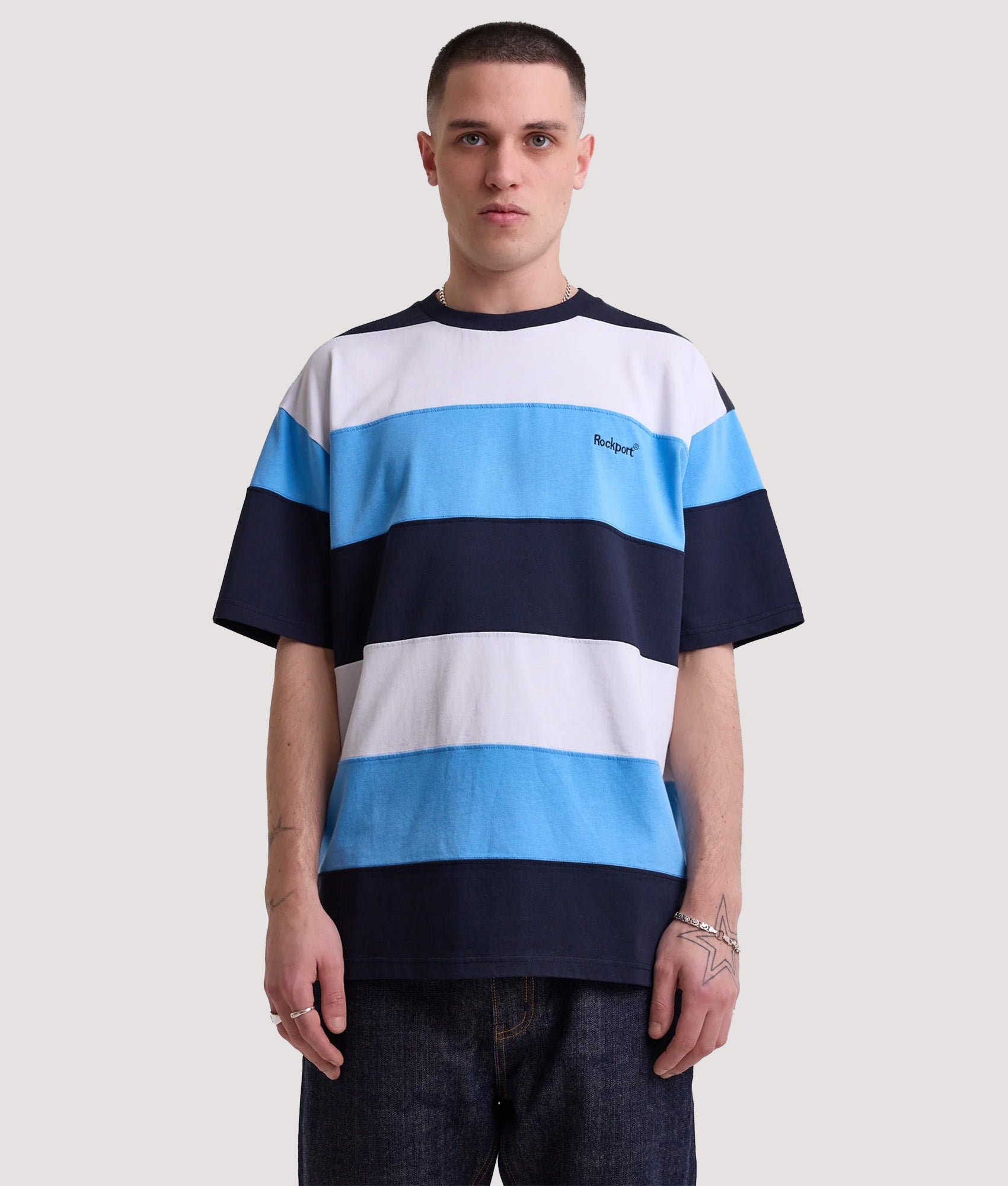 Rockport Relaxed Fit Dyer Stripe T-Shirt in Navy, white and blue stripe at EQVVS Menswear. Model front shot.