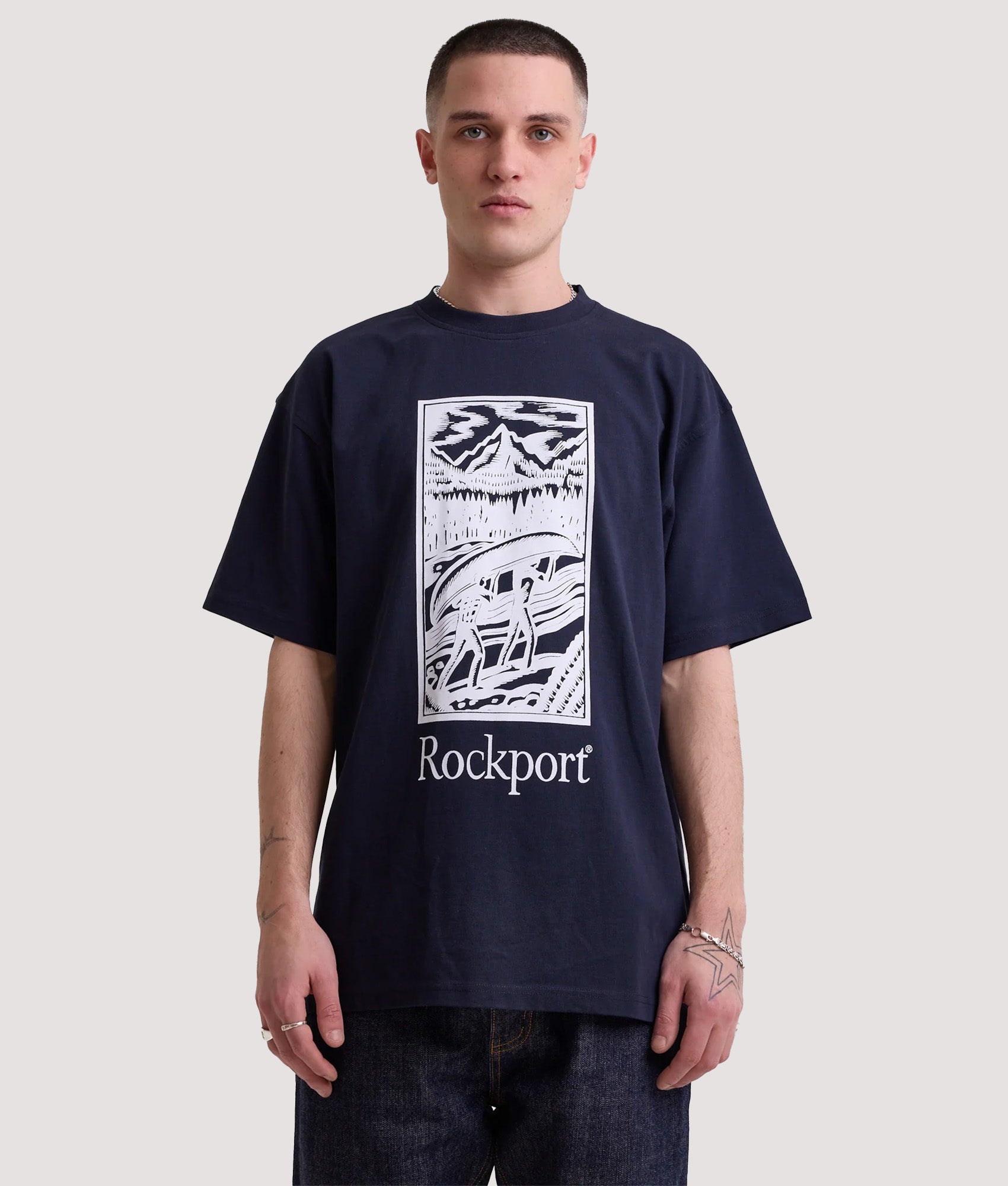 Rockport Relaxed Fit Hampshire Logo T-Shirt in Navy at EQVVS Menswear. Model front shot.