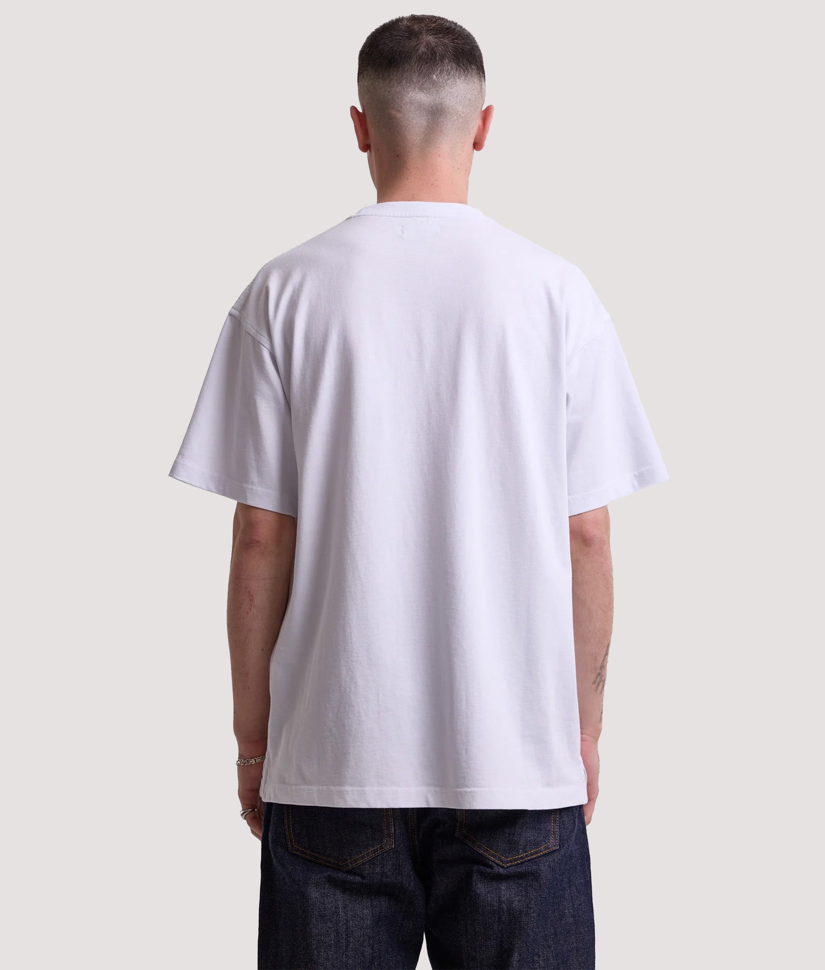 Rockport Relaxed Fit Hampshire Logo T-Shirt in White at EQVVS Menswear. Model back shot.