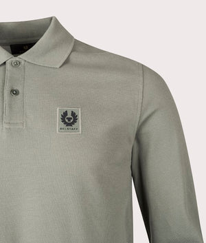 Belstaff Long Sleeved Polo Shirt in Sage Green. 100% Cotton | Belstaff | Shot at EQVVS | Front angele shot 