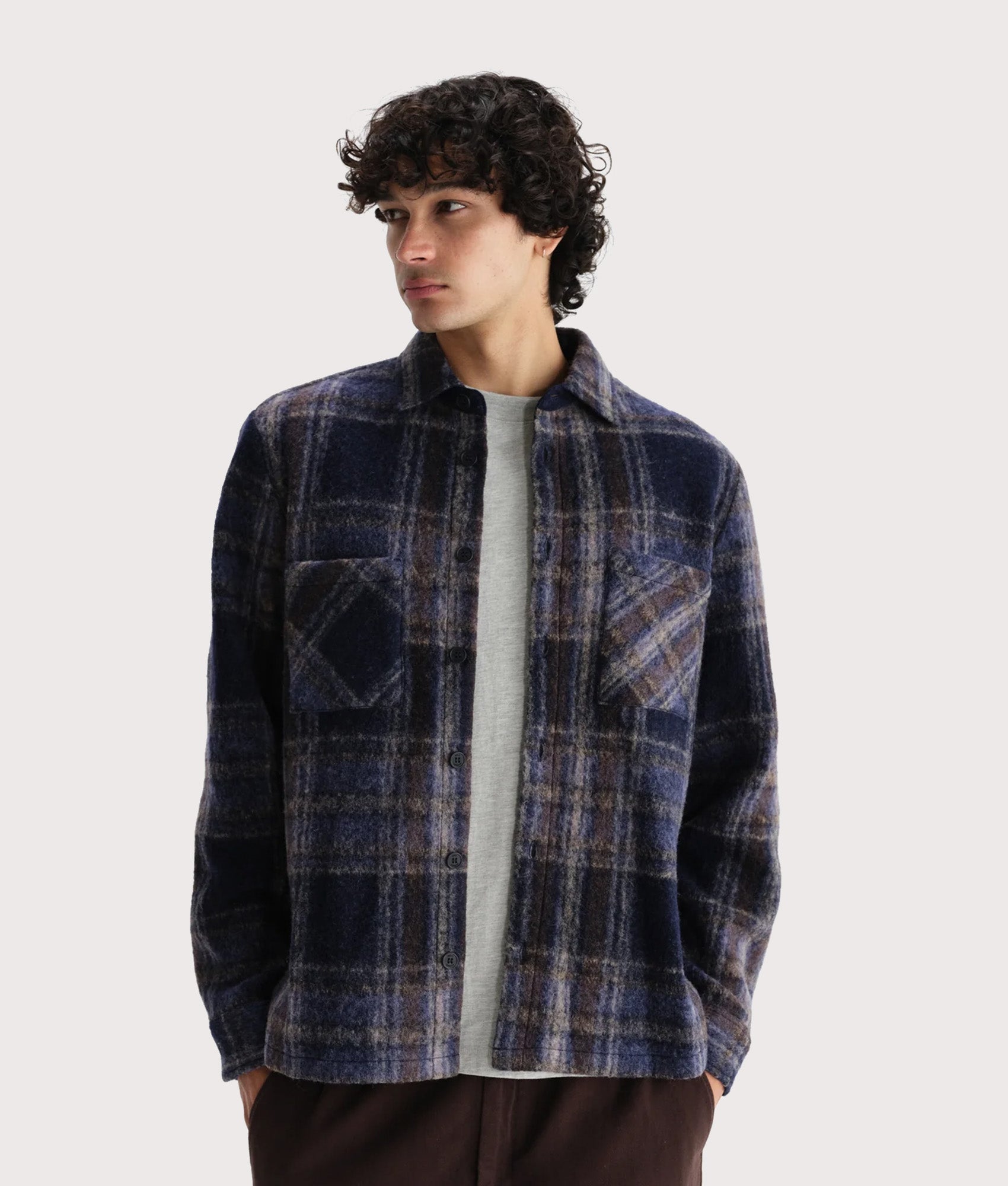 Wax London Whiting Overshirt in Navy at EQVVS Menswear. Model Front shot. 