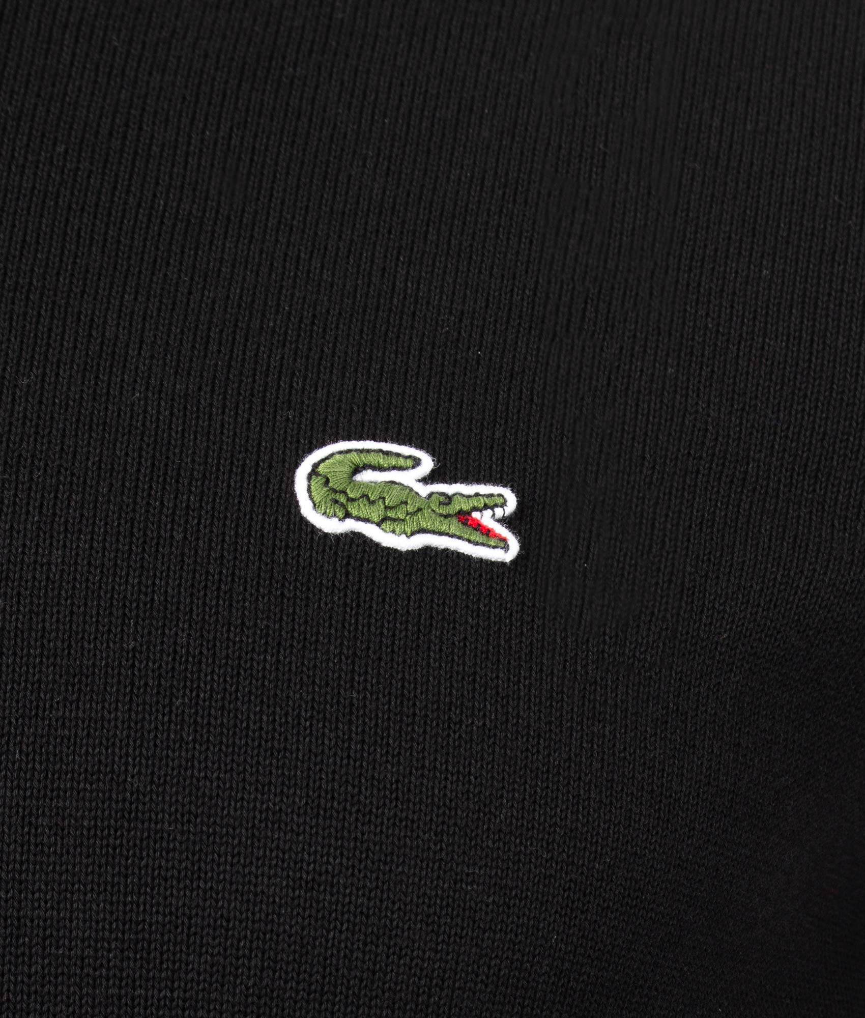 Lacoste Croc Logo Knitted Jumper in Black at EQVVS Menswear. Close up detail shot.
