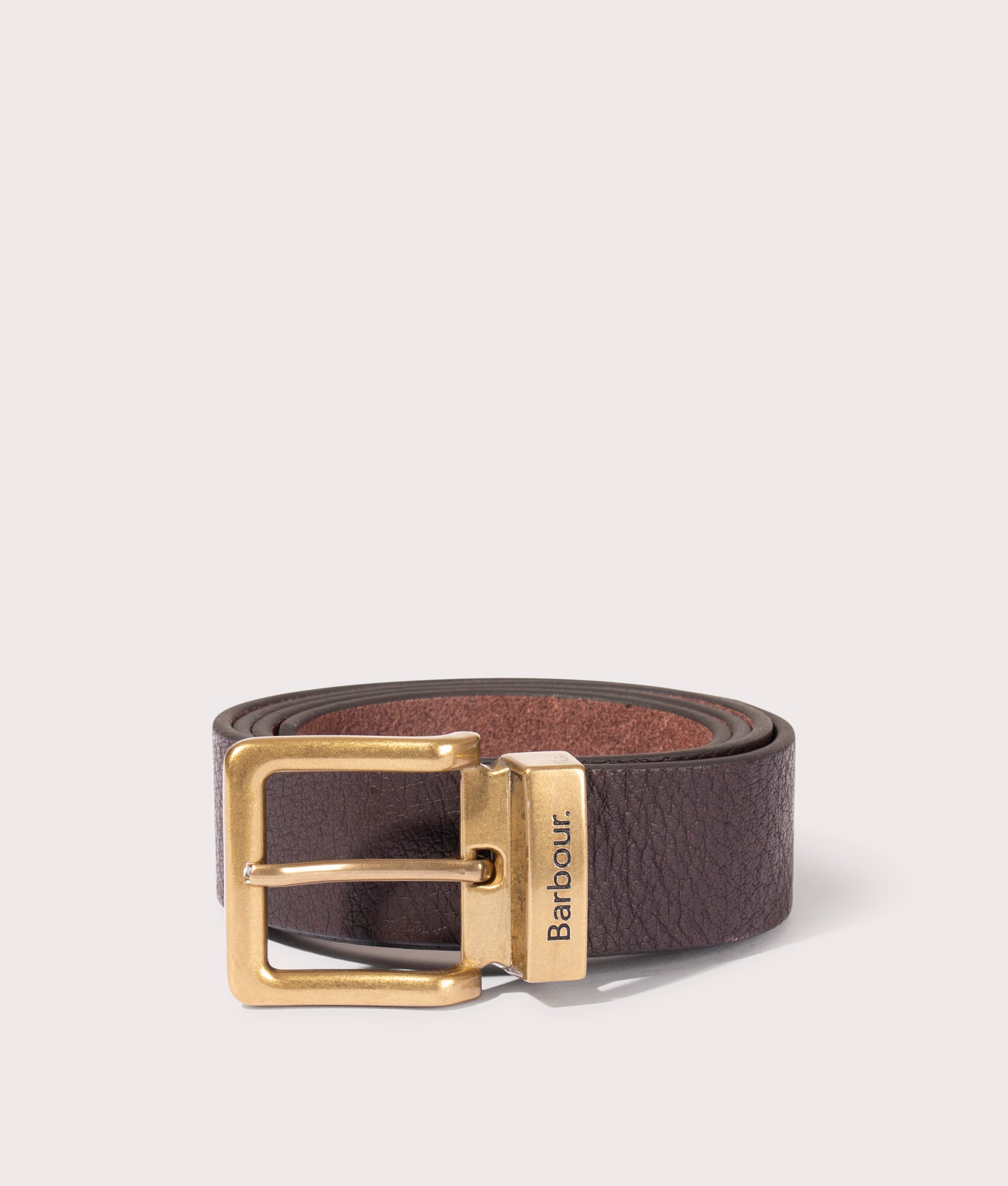 Barbour Lifestyle Blakely Leather Belt in Dark Brown at EQVVS Menswear. Rolled up shot.