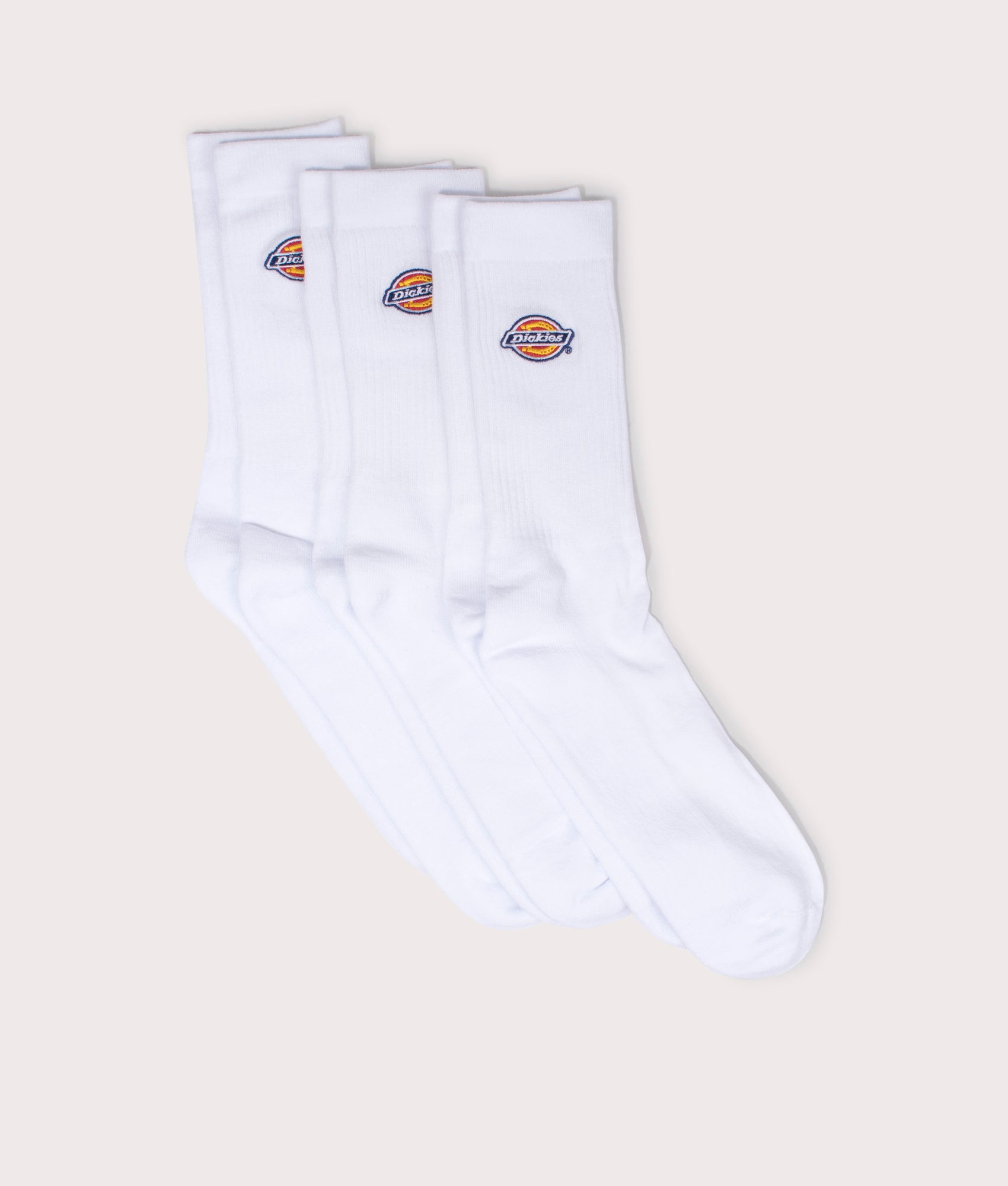 Dickies Three Pack of Valley Grove Embroidered Socks in White. Flat shot at EQVVS.