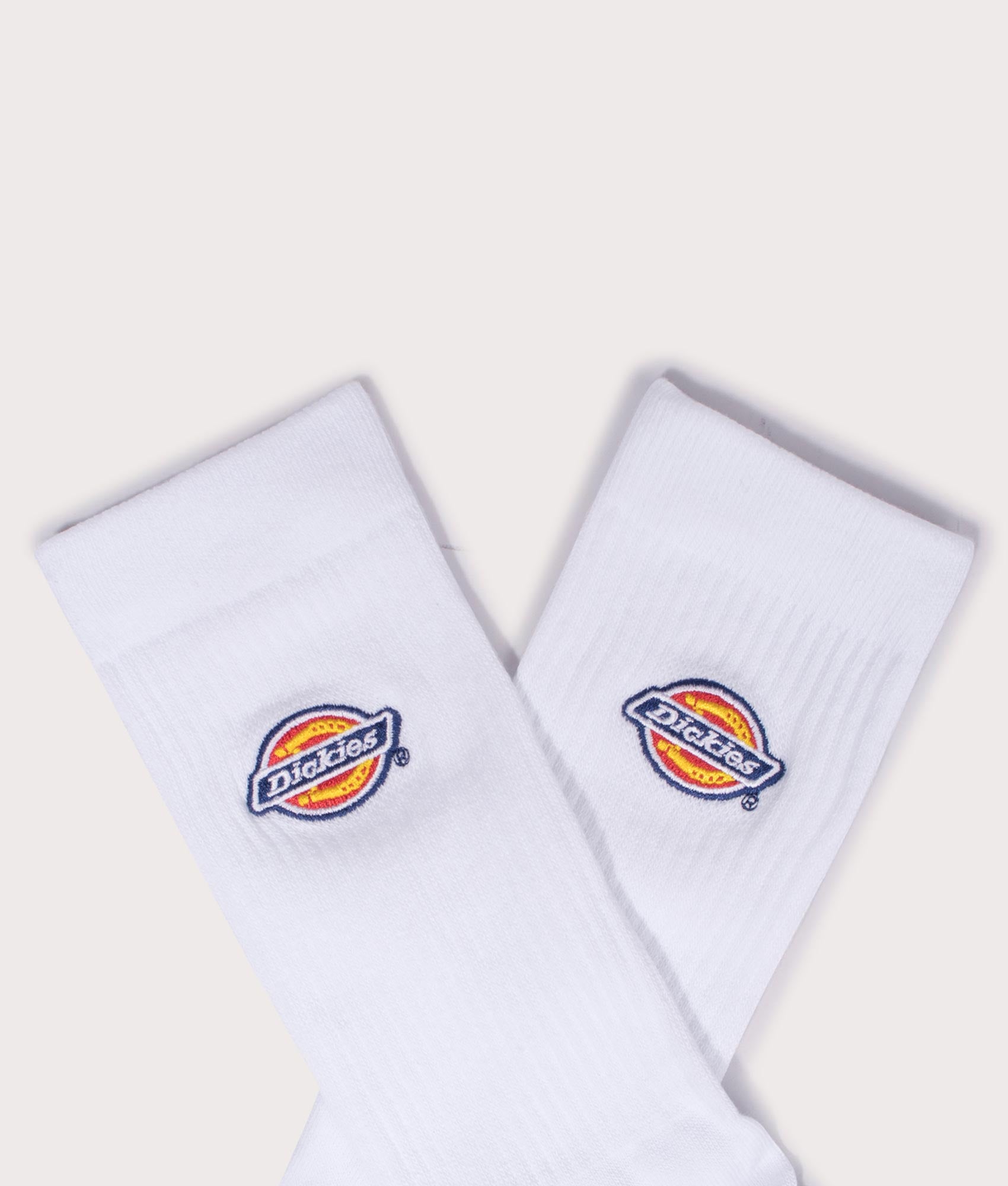 Dickies Three Pack of Valley Grove Embroidered Socks in White. Detail flat shot at EQVVS.