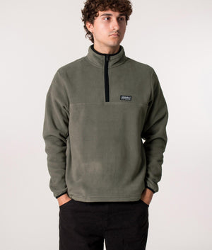 Gramicci Mock Neck Quarter Zip Fleece in Grey at EQVVS. Model front