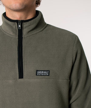 Gramicci Mock Neck Quarter Zip Fleece in Grey at EQVVS. Model detail