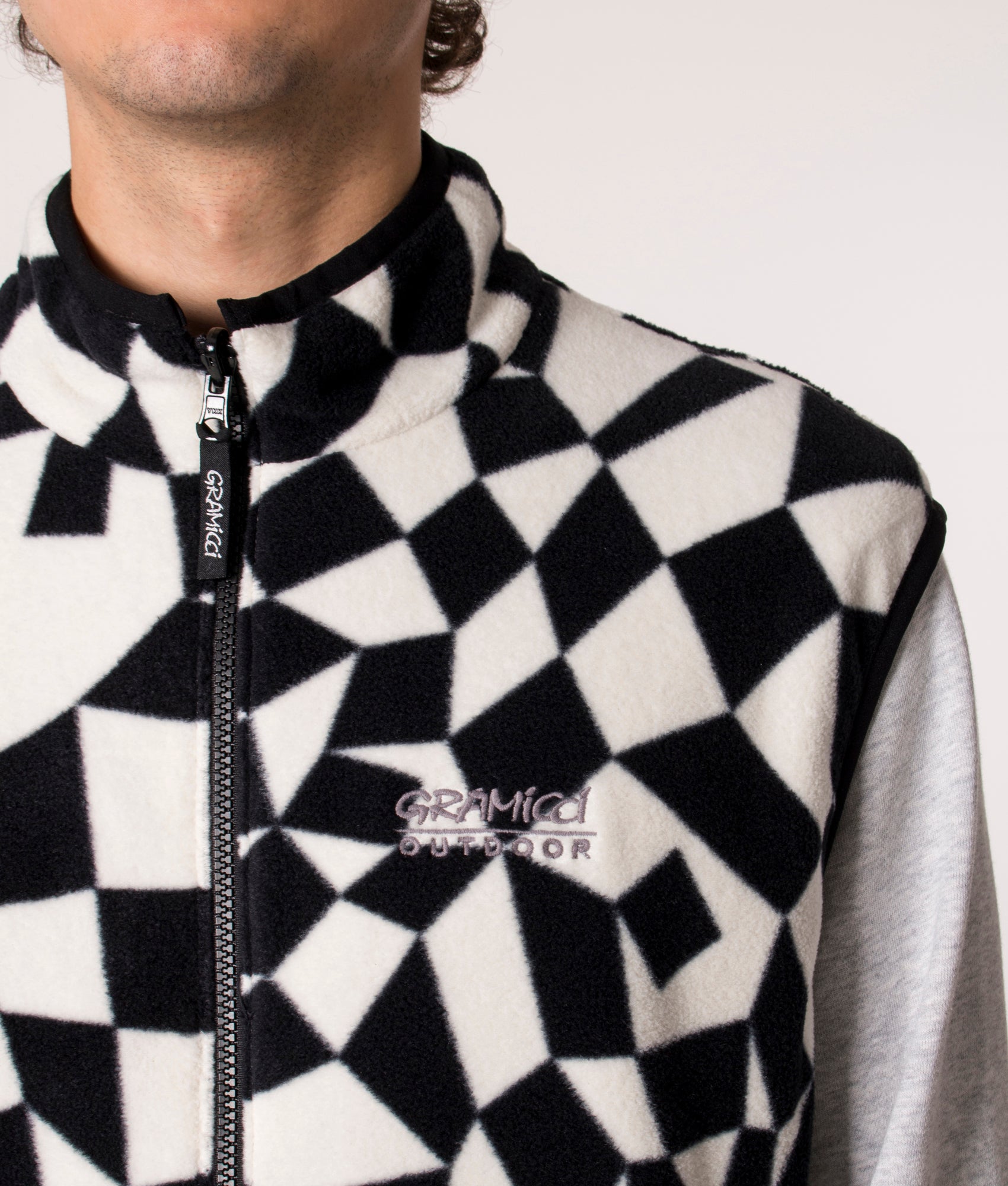 Gramicci Reversible Vest in Black Check, EQVVS. Model, detail.