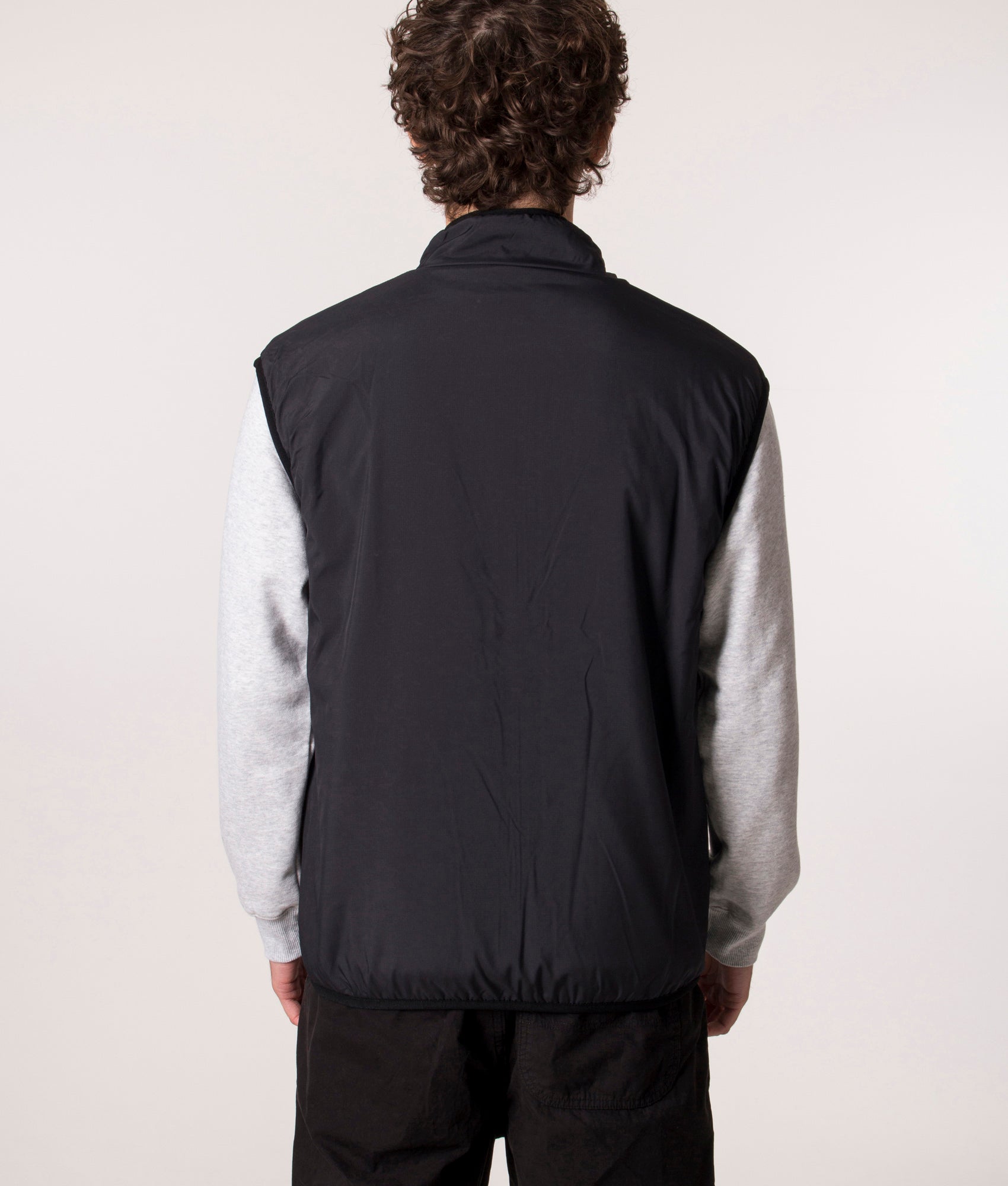 Gramicci Reversible Vest in Black Check, EQVVS. Model, reverse.