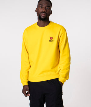 Crest Logo Sweatshirt in Yellow by KENZO at EQVVS. Front shot. 