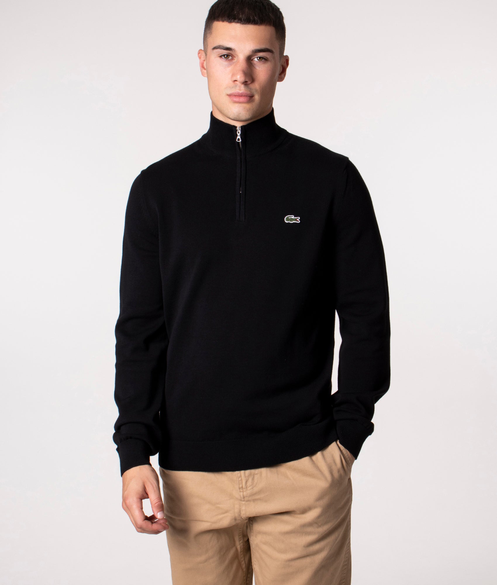 Lacoste Quarter Zip Knit in Black at EQVVS Menswear. Model front shot.