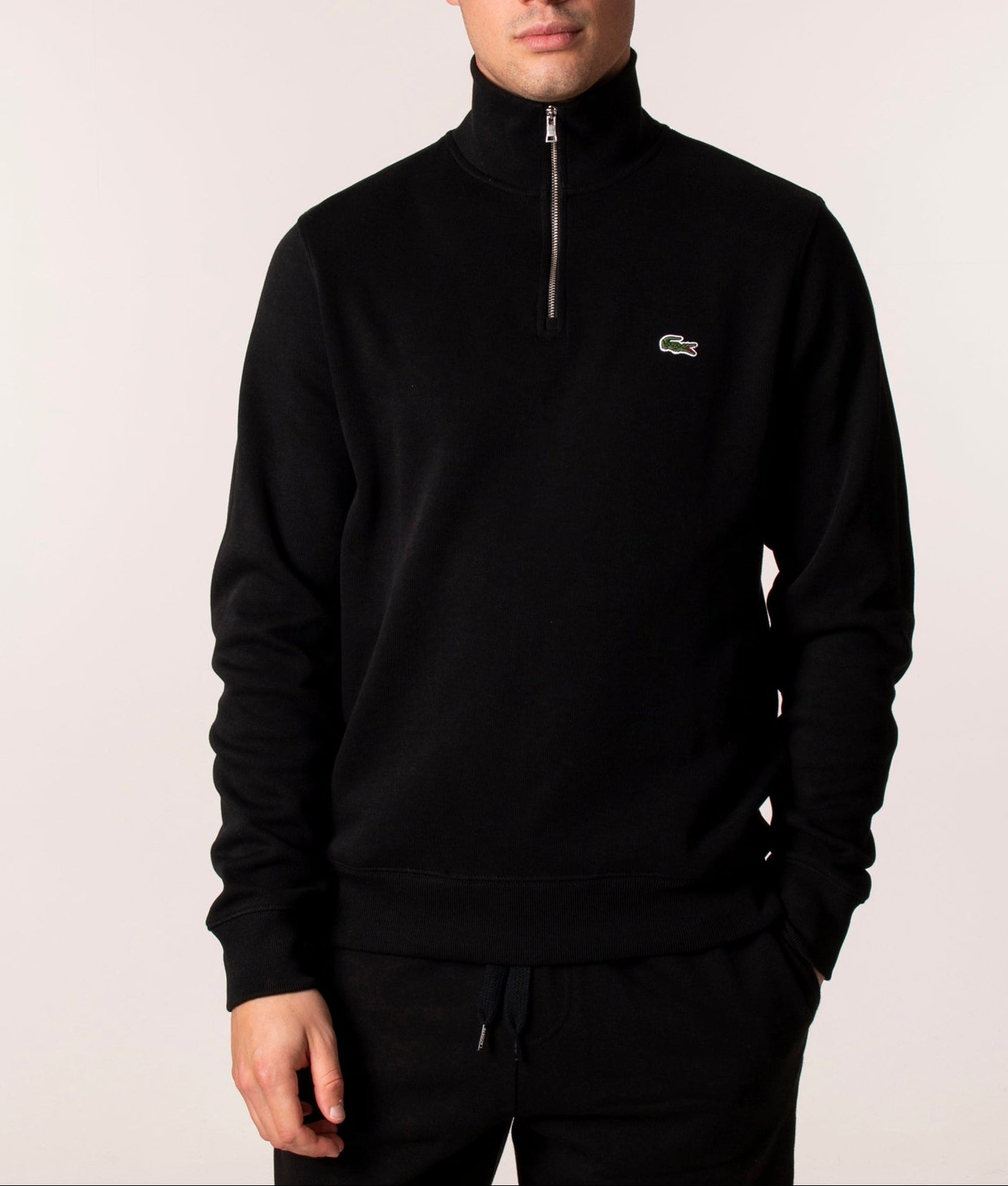 Lacoste Quarter Zip Croc Logo Sweatshirt at EQVVS Menswear. Model front Shot.