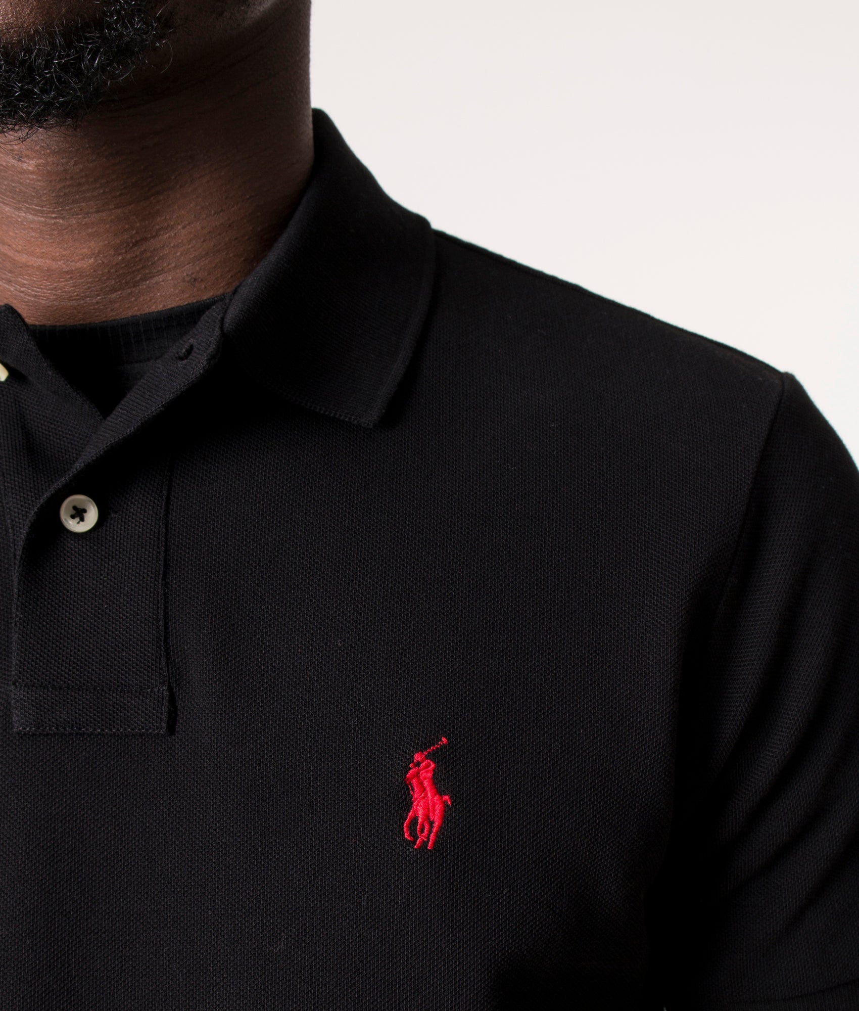 Custom Slim Fit Mesh Polo Shirt in Polo Black at EQVVS Menswear. Detail shot.