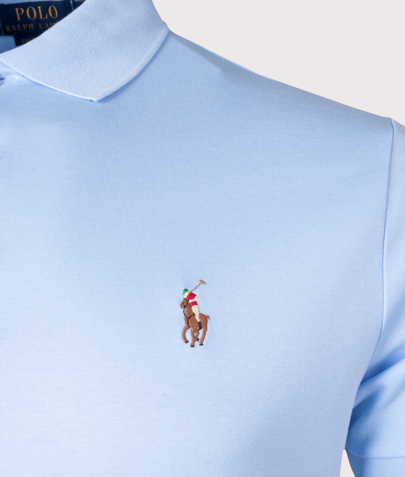 Polo Ralph Lauren Custom Slim Fit Interlock Polo Shirt in Elite Blue at EQVVS Menswear. Detail Shot. 