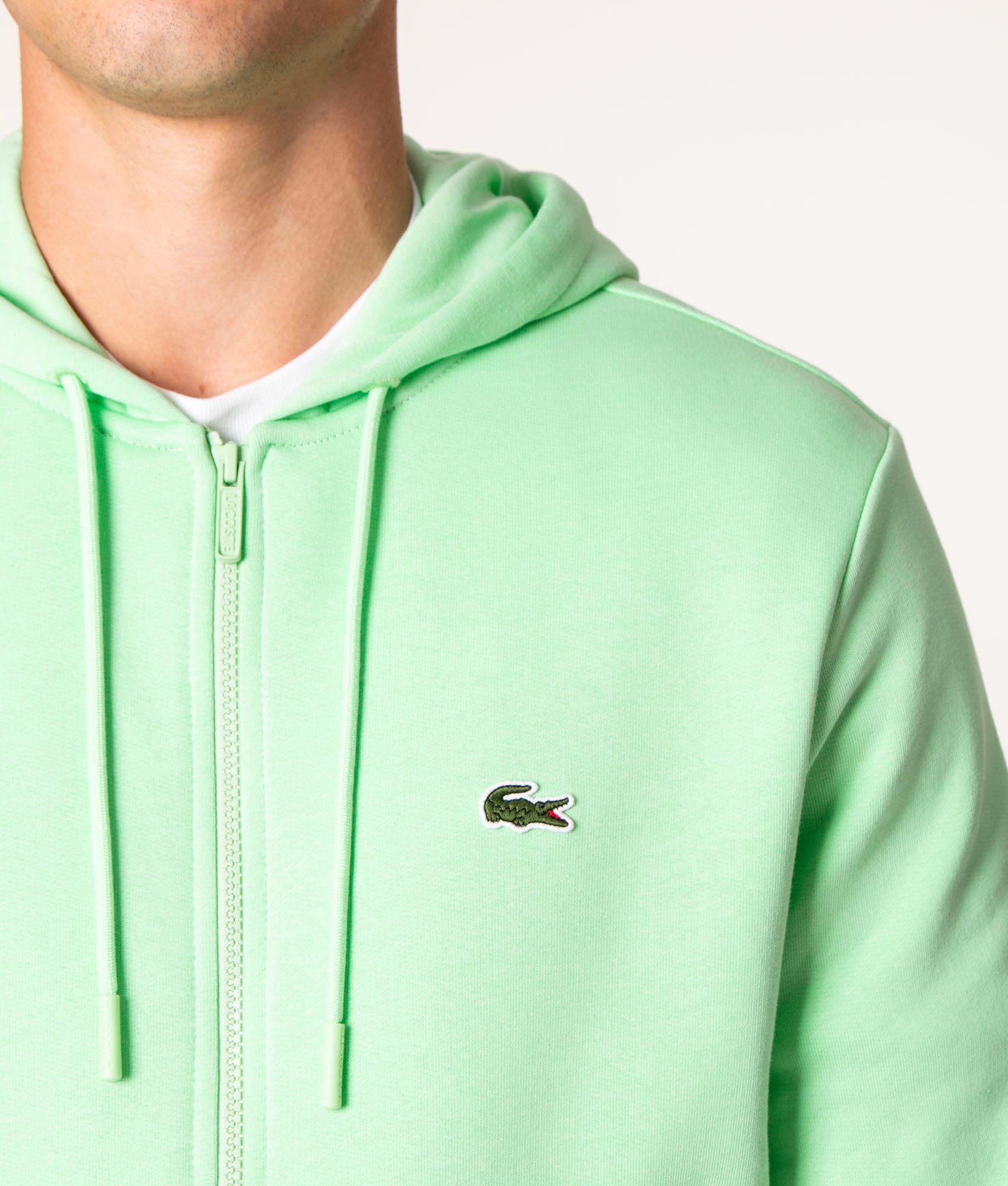 Lacoste Zip Through Logo Hoodie in Ash at EQVVS, Model front detail